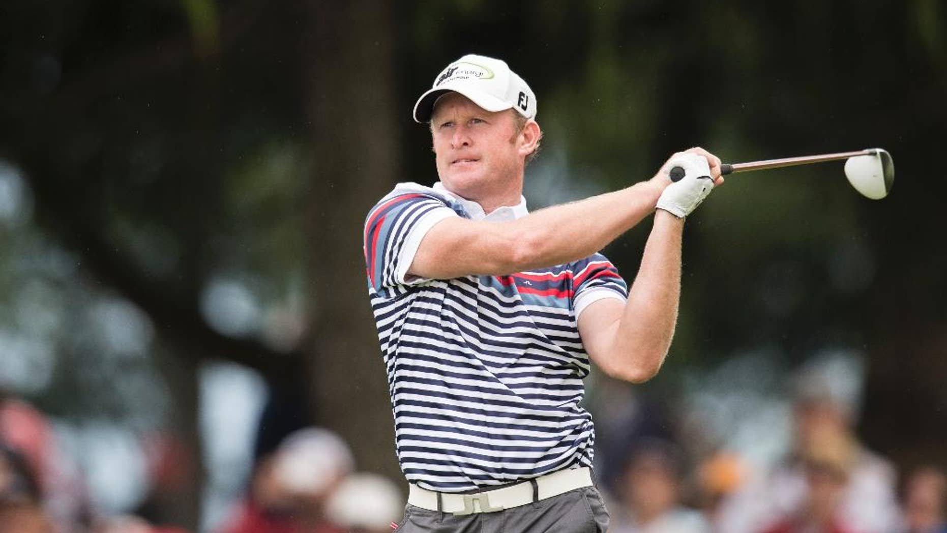 Jamie Donaldson of Wales tees off at hole 9 during the second round of the Omega European Masters Golf Tournament in Crans-Montana, Switzerland, Friday, September 5, 2014. (AP Photo/Keystone/Ennio Leanza)