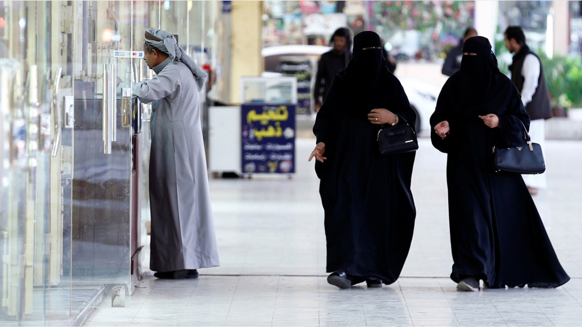 A top cleric in Saudi Arabia said Friday that women should not be forced to wear long black robes any longer.
