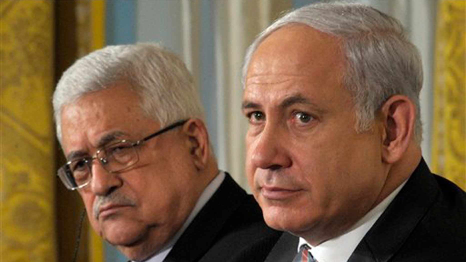 Sept. 1, 2010: Palestinian President Mahmoud Abbas, left, and Israel's Prime Minister Benjamin Netanyahu listen during remarks at the White House.