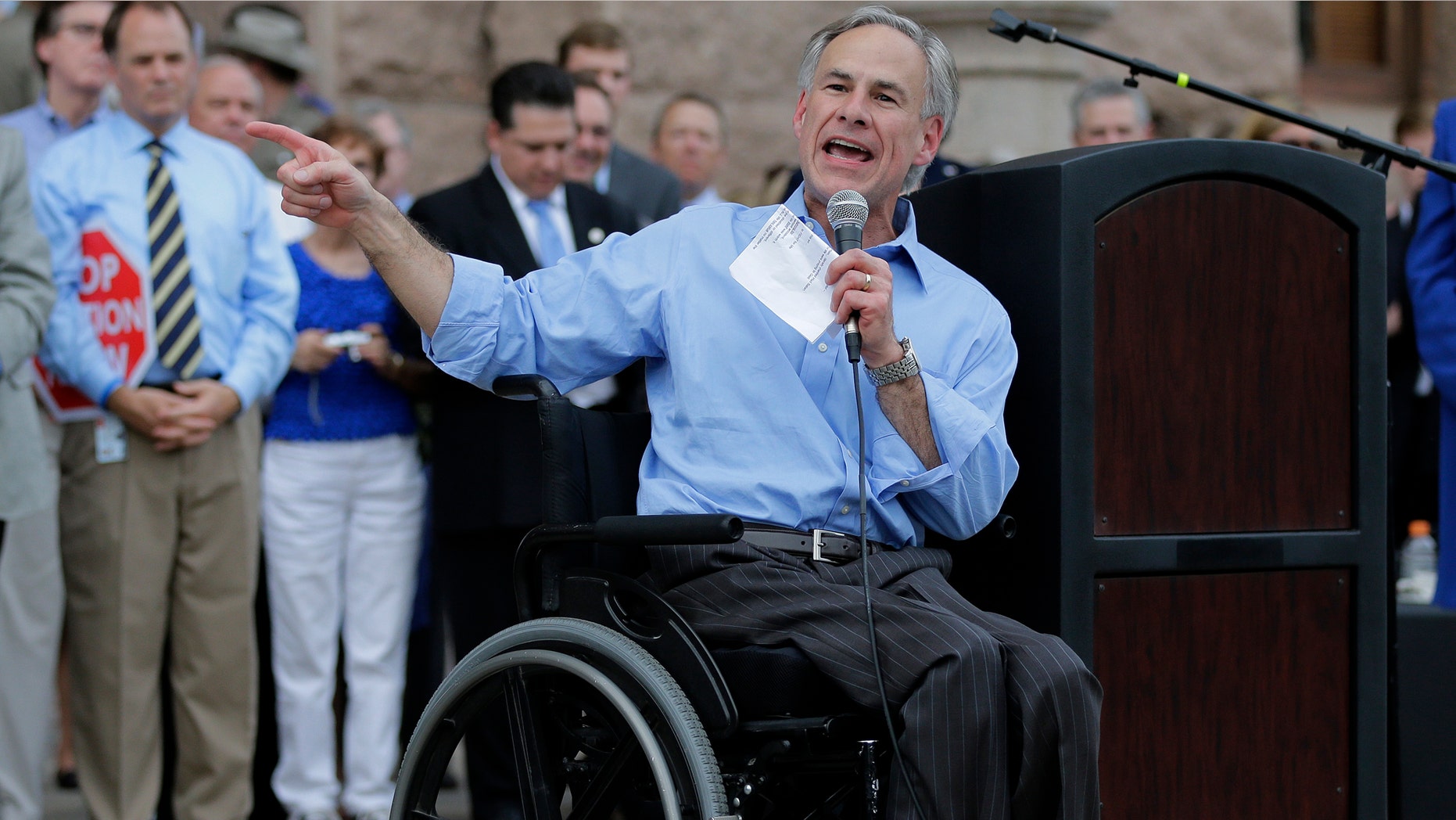 In this Monday, July 8, 2013 photo Texas Attorney General Greg Abbott speaks to a anti-abortion rally, in Austin, Texas. (AP Photo/Eric Gay)