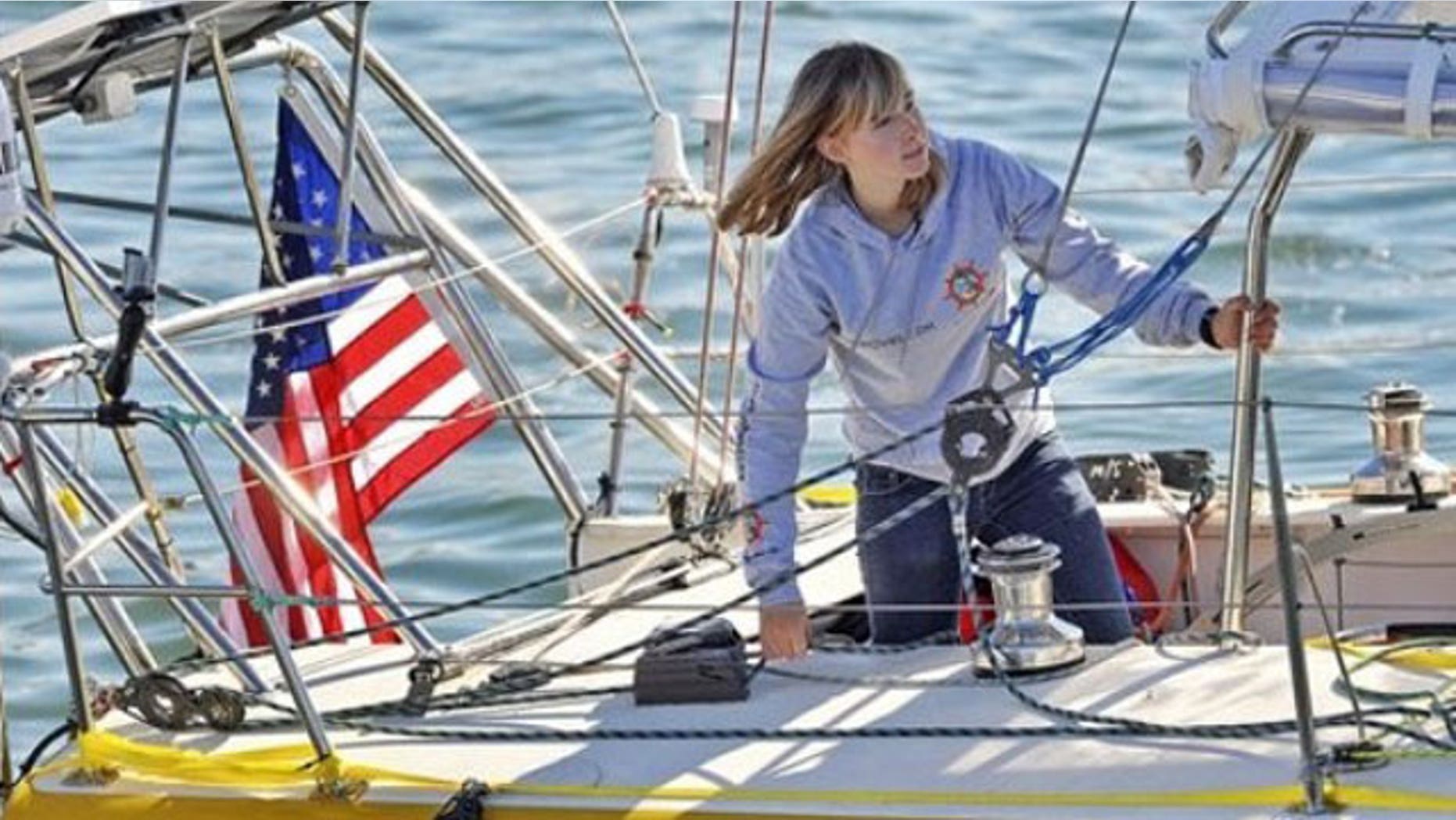 Abby Sunderland, 16, looks out from her sailboat, Wild Eyes, as she leaves for her world record attempting journey at the Del Rey Yacht Club in Marina del Rey, Calif. (AP)