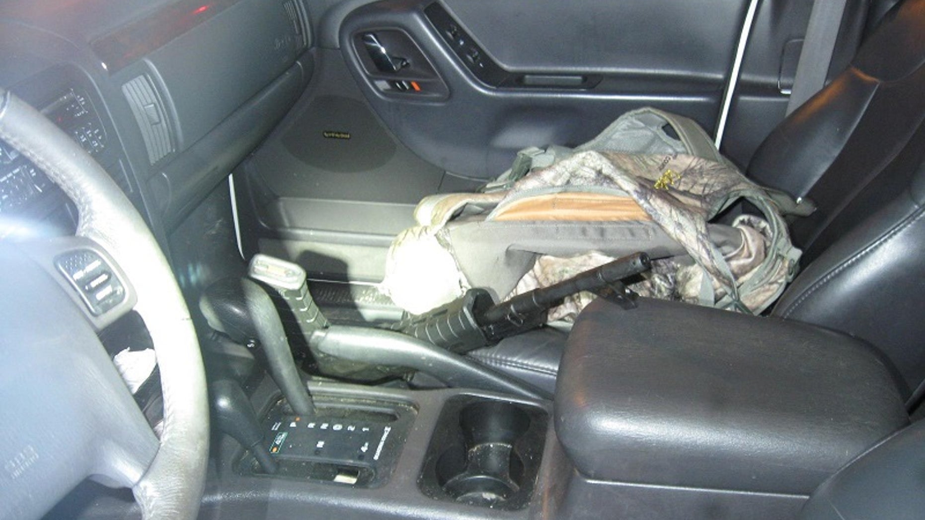 Police said an armed man stopped his car in an intersection and yelled he needed to fight the “lizard people.”
