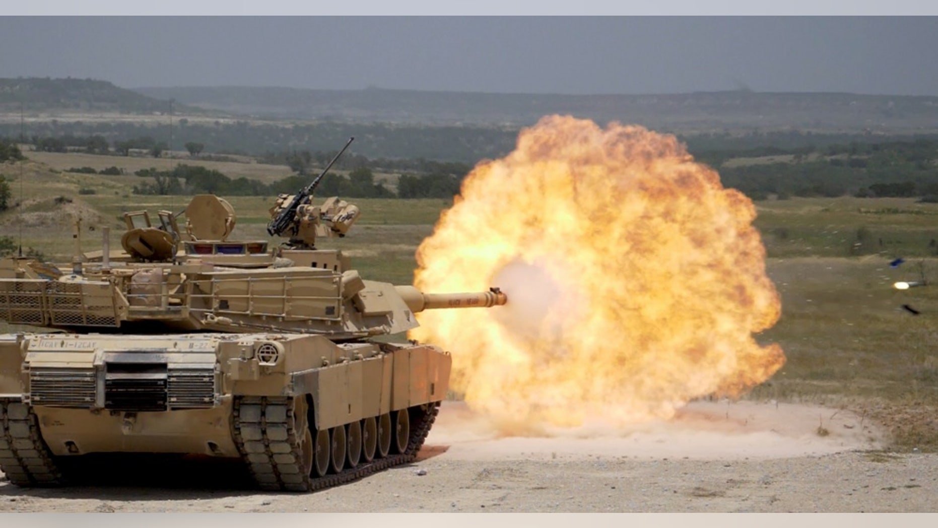 File photo - FORT HOOD, Tx--A Sabot round is fired from an M1A2 Abrams tank during 3rd Armored Brigade, 1st Cavalry Division gunnery qualification.