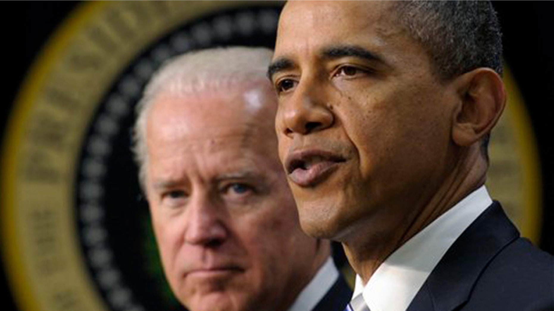 FILE - In a Feb. 21, 2012 file photo President Barack Obama, accompanied by Vice President Joe Biden, speaks in the Eisenhower Executive Office Building on the White House complex in Washington. A previously undisclosed Biden memo to Obama in November 2009 reflects his view that military commanders were asking Obama to take a leap by adding tens of thousands of forces in Afghanistan whose role was poorly defined. (AP Photo/Susan Walsh/file)