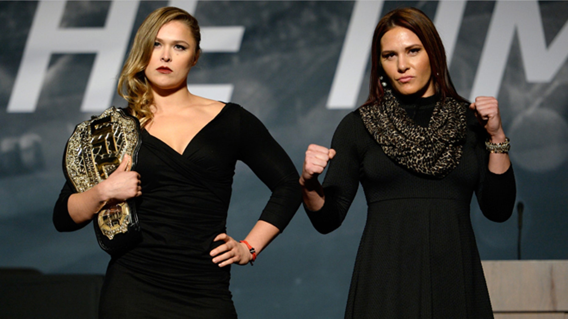 LAS VEGAS, NEVADA - NOVEMBER 17: UFC women's bantamweight champion Ronda Rousey (L) and challenger Cat Zingano pose for the media during the UFC Time Is Now press conference at The Smith Center for the Performing Arts on November 17, 2014 in Las Vegas, Nevada. (Photo by Jeff Bottari/Zuffa LLC/Zuffa LLC via Getty Images)