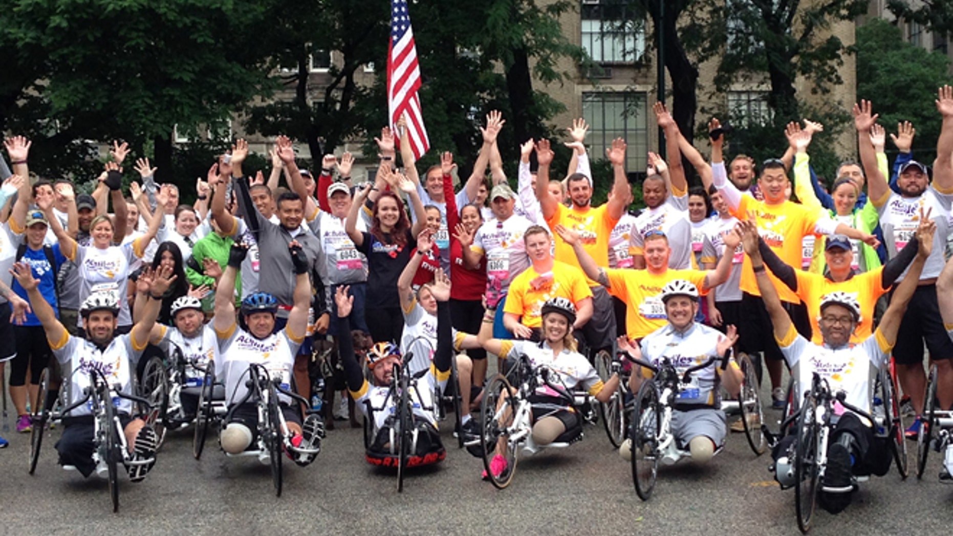 Shown here are veterans working with Achilles International, which trains disabled vets to compete in marathons. (Courtesy of Achilles International)