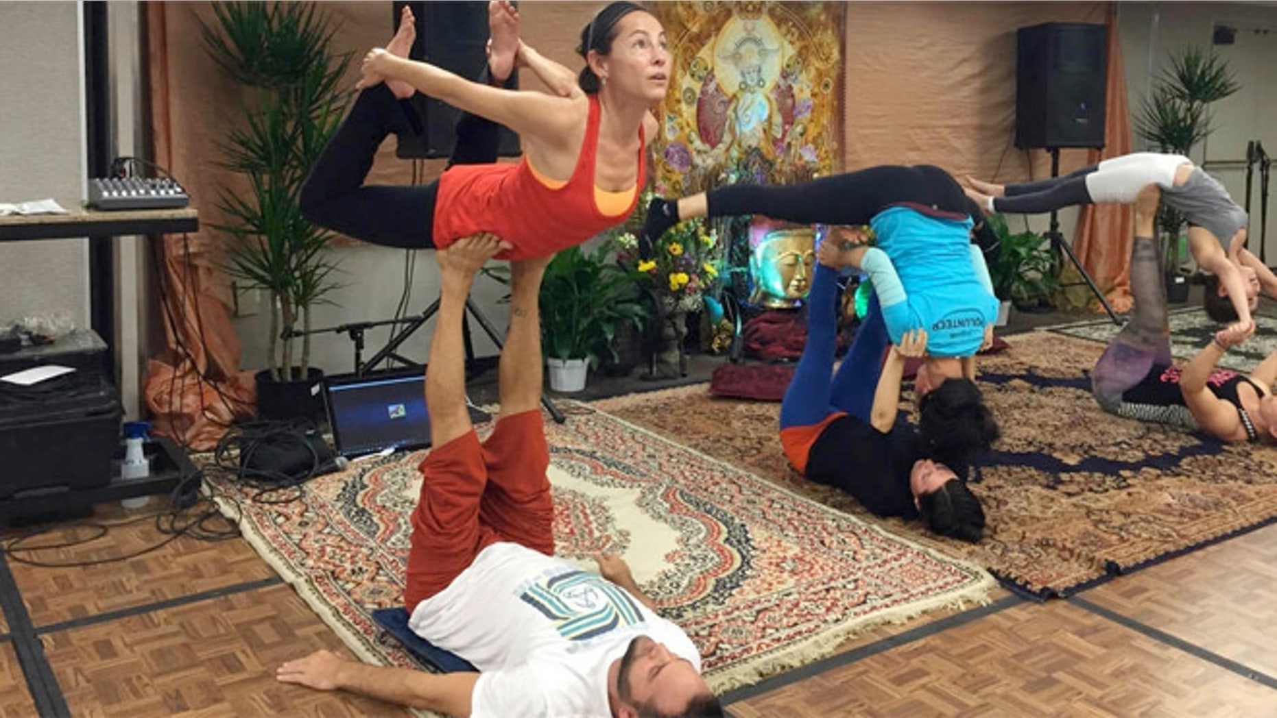 Trust is a key component in AcroYoga, as with this bow pose which had me high off the ground.