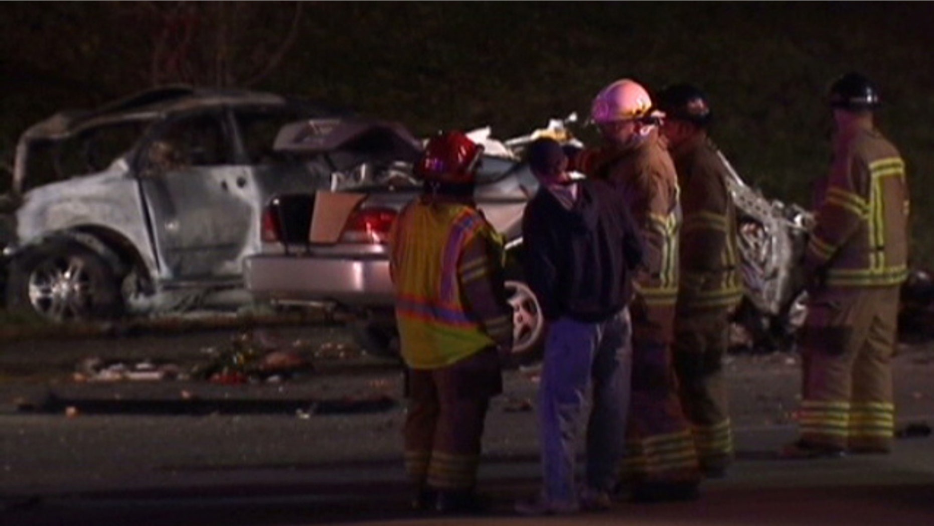 Oct. 23, 2011: First responders on the scene after a deadly car accident in Southfield, Mich.