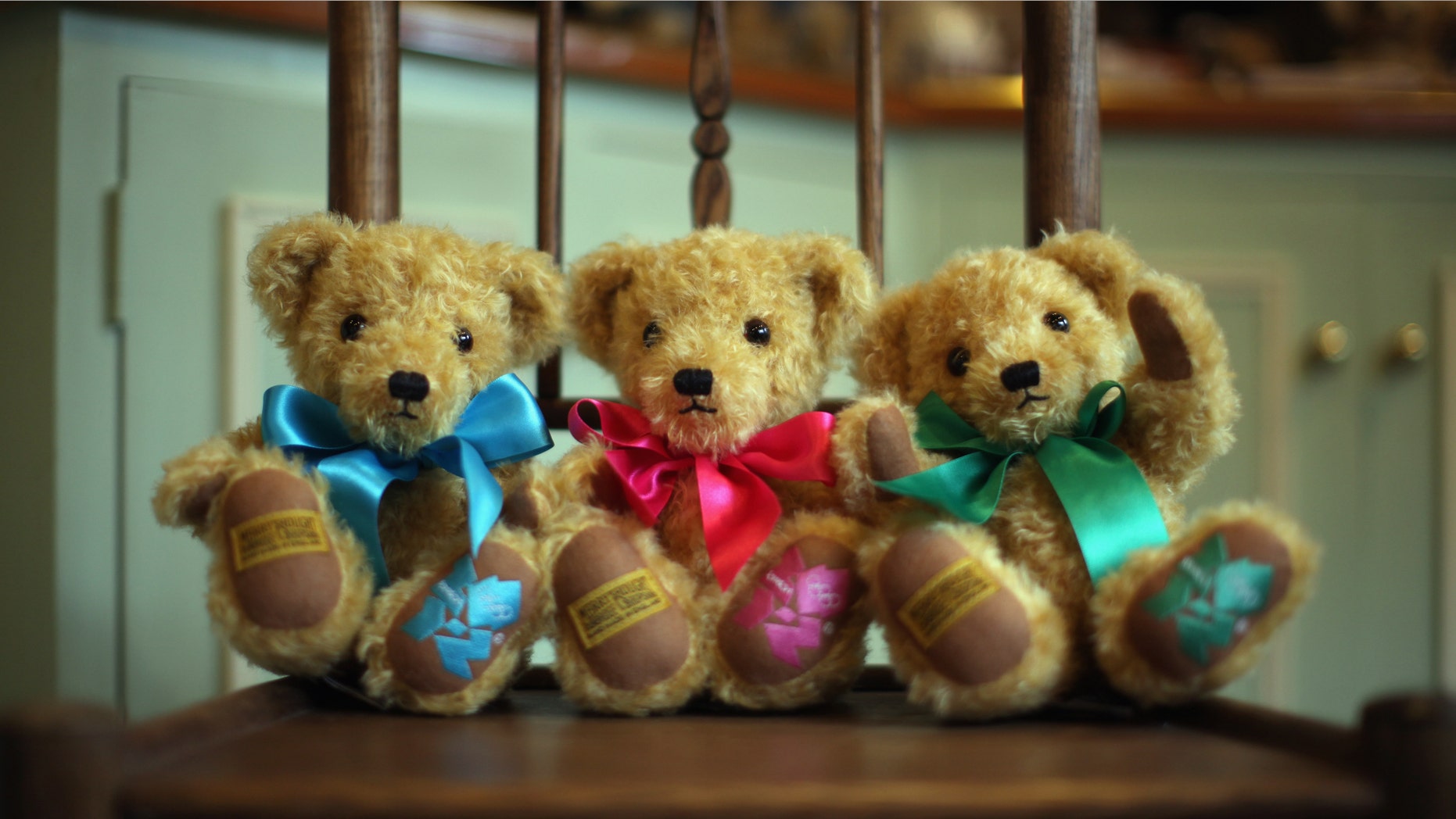 IRONBRIDGE, UNITED KINGDOM - APRIL 05: Official teddy bears commemorating the 2012 London Olympics sit in the shop of the Merrythought teddy bear factory on April 5, 2011 in Ironbridge, England. Established in 1930, Merrythought has been hand-making Teddy Bears for over 80 years in Shropshire. The family-run company is the last remaining British teddy bear factory and is launching its latest limited edition bear to mark the royal wedding. The Commemorative Royal Wedding bear is limited to 75 and comes after its popular Prince William and Catherine Middleton bears completely sold out. Merrythought has also been selected by the London Olympic Games organisers to produce the official teddy bears of the London 2012 Olympic and Paralympic games. (Photo by Christopher Furlong/Getty Images)