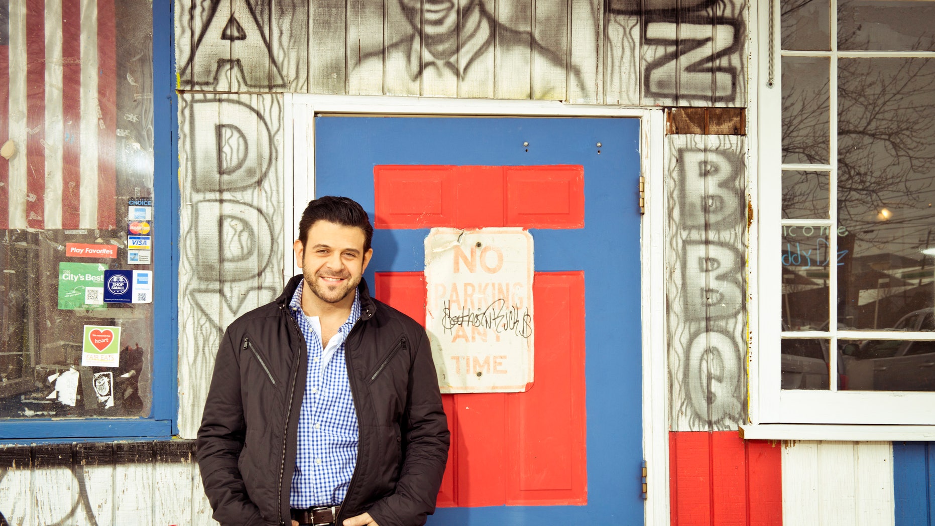 Adam Richman of the new series "Man Finds Food" in Atlanta.