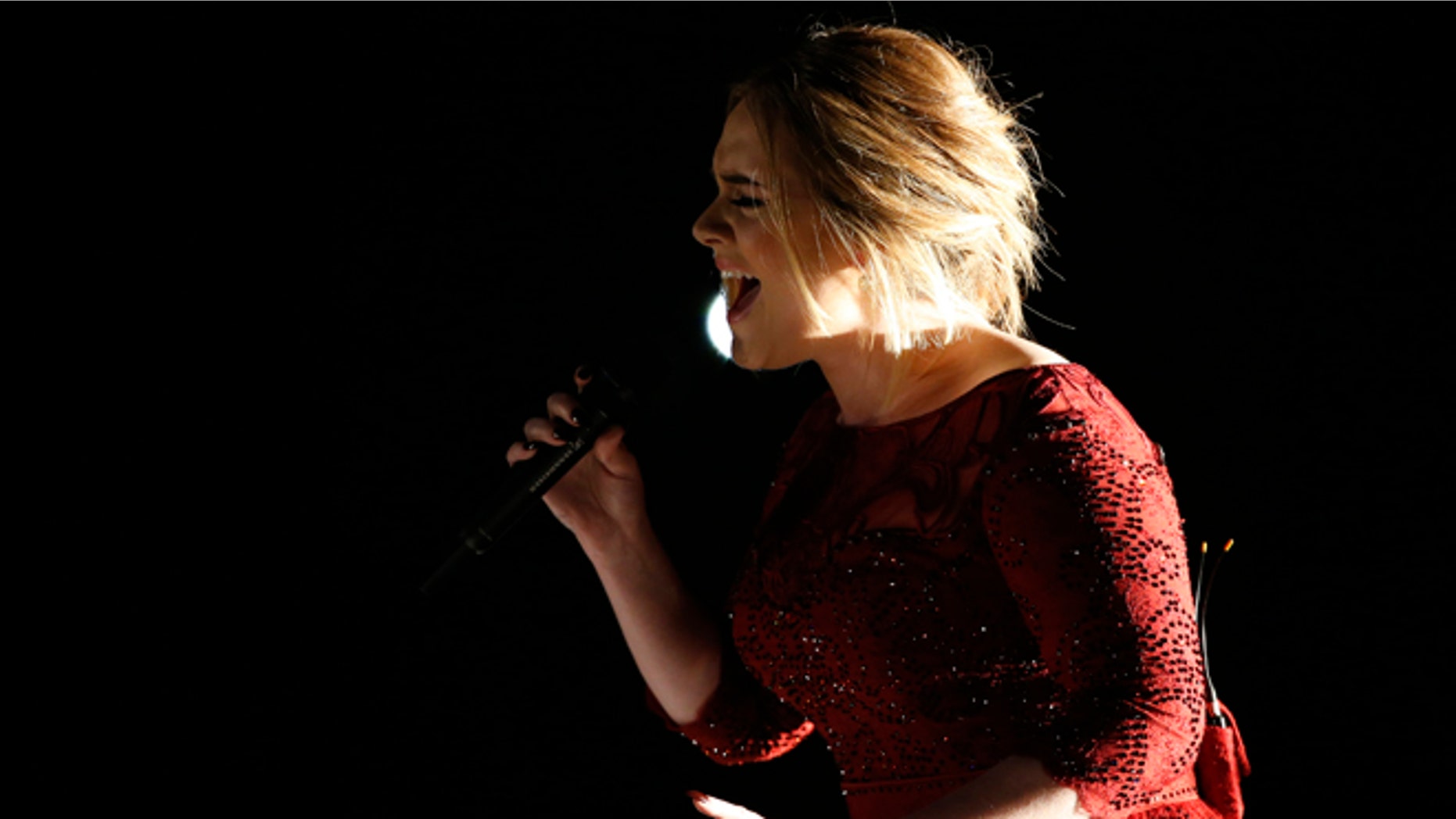 February 15, 2016. Singer Adele performs "All I Ask" on stage at the 58th Grammy Awards in Los Angeles, California.