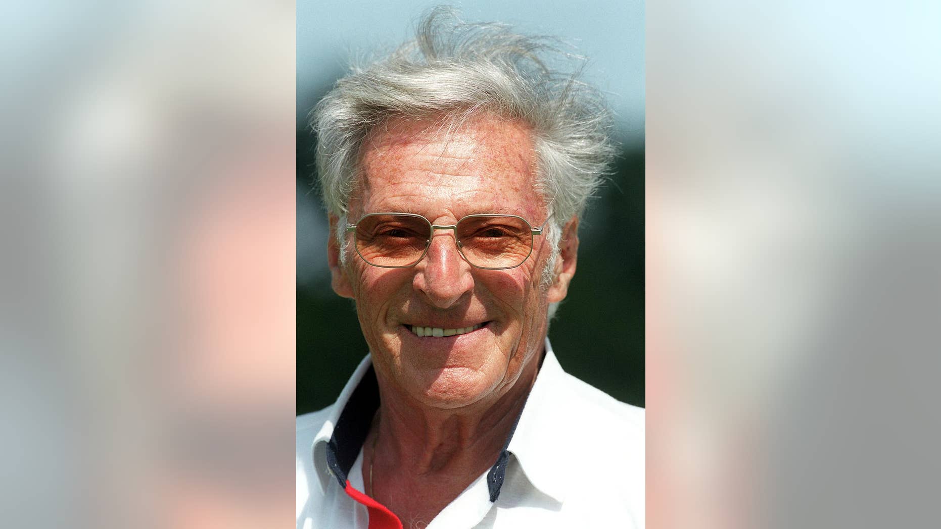 FILE - In this June 9, 1999 file photo Ferdy Kuebler, Swiss cycling legend, is pictured in Birmensdorf, Switzerland. Kuebler, who came back from injury and the interruption of World War II to win the 1950 Tour de France died on Thursday, Dec. 29, 2016 at the age of 97. (Martin Ruetschi/Keystone via AP file)
