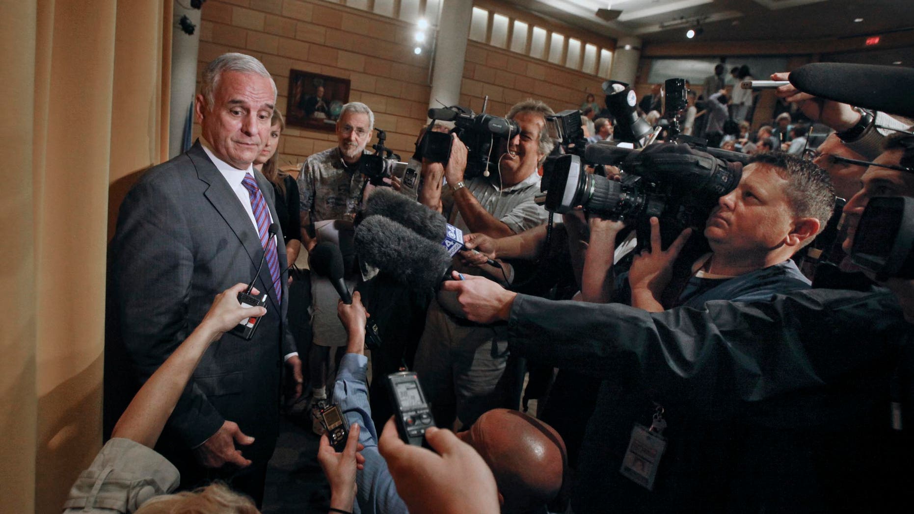 July 14: Gov. Mark Dayton speaks to the media at the University of Minnesota's Hubert H. Humphrey School after announcing he would seek a budget deal with GOP leaders in Minneapolis.