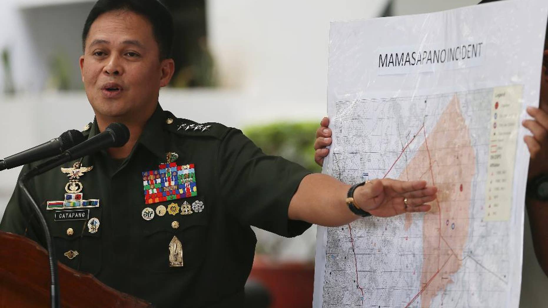 FILE - In this Feb. 4, 2015 file photo, Philippine Armed Forces Chief Gen. Gregorio Pio Catapang points to the map where the alleged clash between elite police commandos known as Special Action Forces (SAF) and Muslim rebels took place on Jan. 25 during a news conference at the Armed Forces of the Philippines headquarters at Camp Aguinaldo in suburban Quezon city, northeast of Manila, Philippines. A monthlong Philippine offensive against hard-line Muslim rebels ended Monday, March 30 after 139 insurgents were killed, 12 others were captured and bomb-making strongholds were seized by troops, the military chief said. (AP Photo/Bullit Marquez, File)