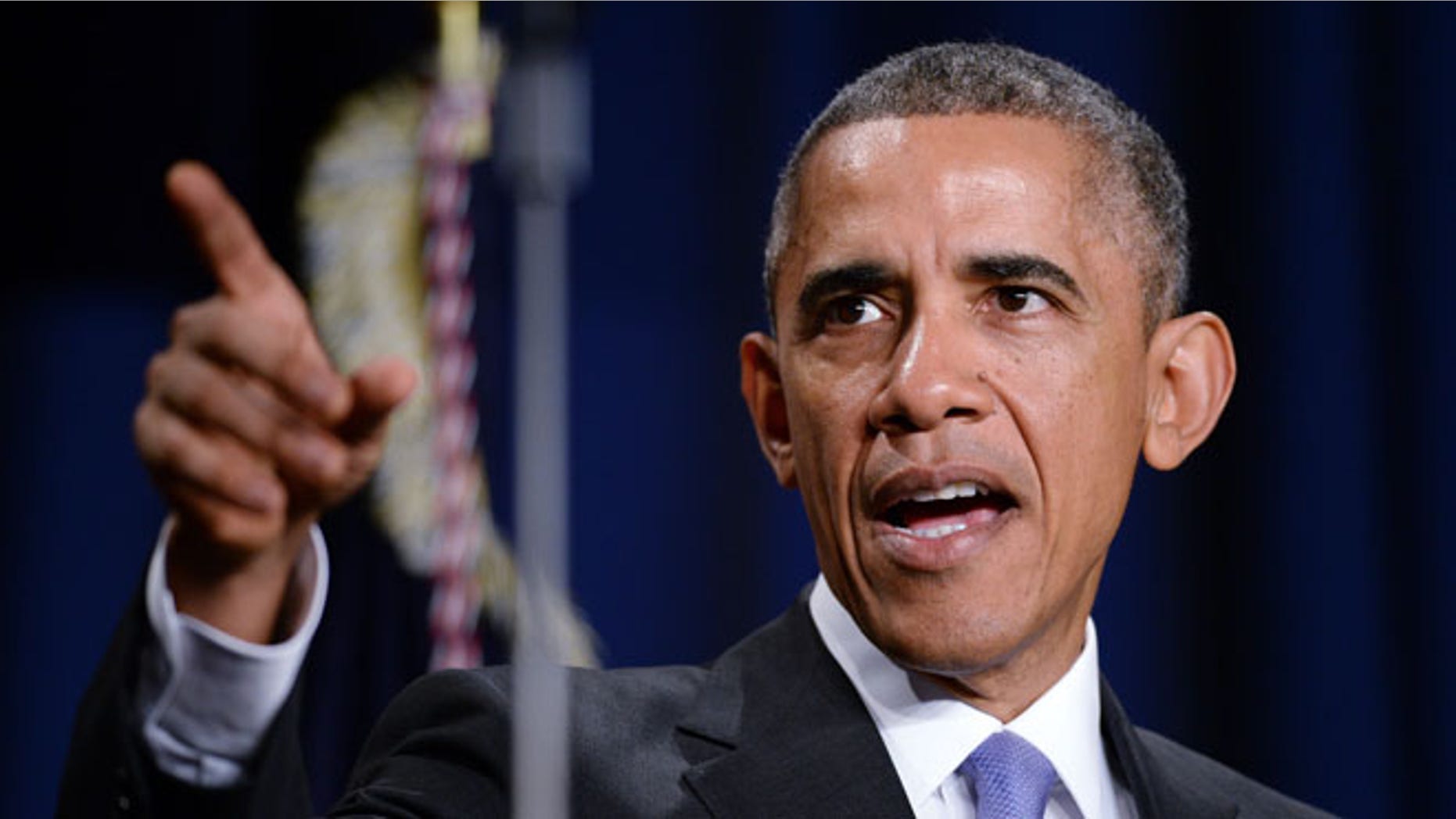 WASHINGTON, DC - DECEMBER 9: US President Barack Obama speaks at an event for the Senior Executive Service at the Washington Hilton on December 9, 2014 in Washington, DC. The Senior Executive Service (SES) is composed of the senior leadership of the Federal workforce. (Photo by Olivier Douliery-Pool/Getty Images)