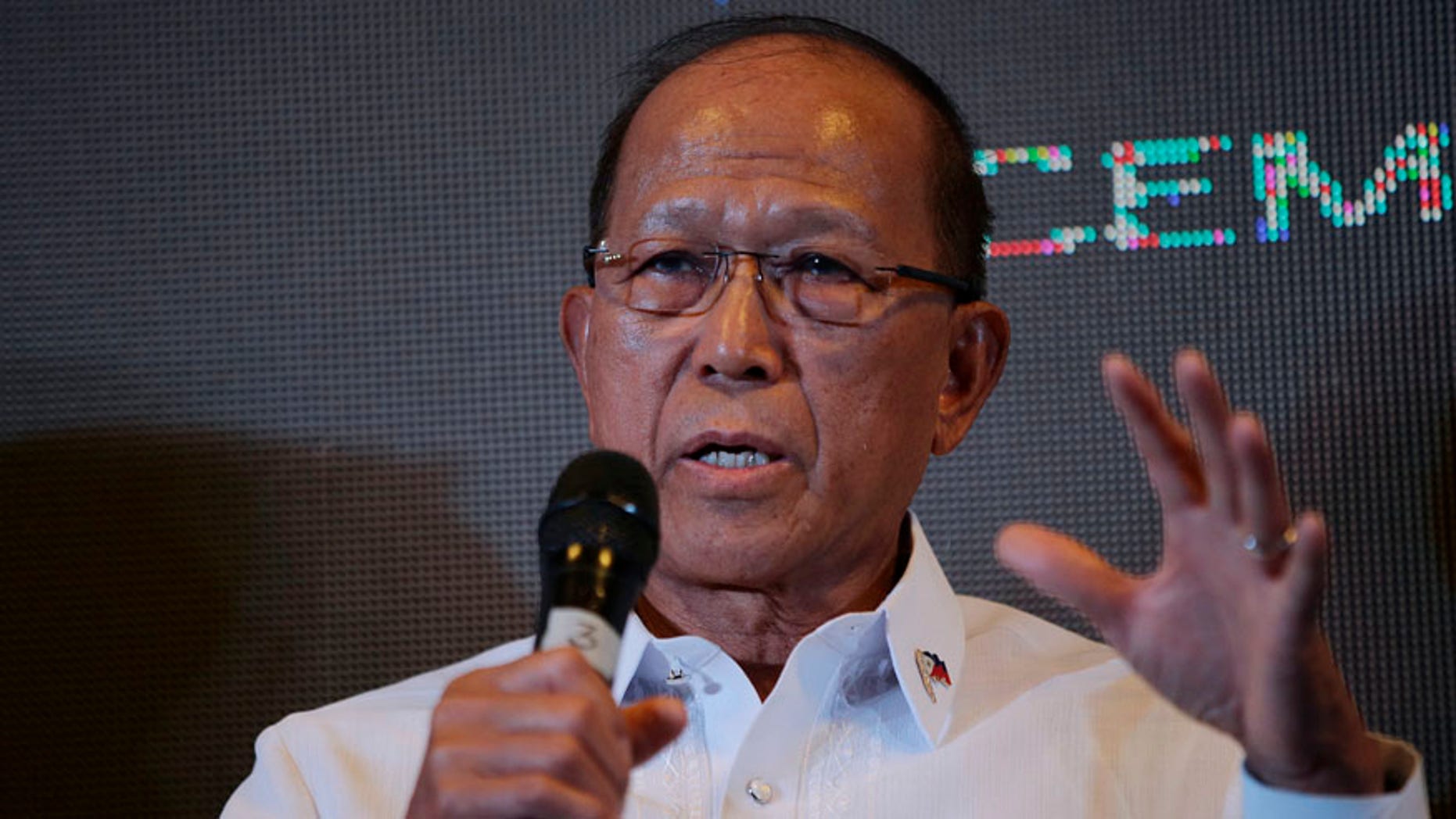 Philippine Defense Secretary Delfin Lorenzana gestures during a conference in Makati, south of Manila, Philippines on Thursday, Dec. 8, 2016