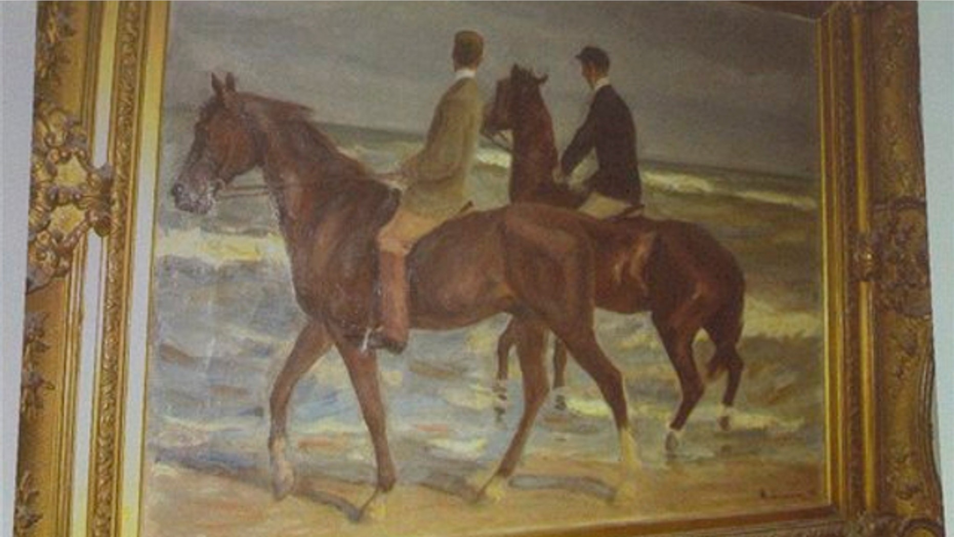 Nov.5, 2013: A painting from Max Liebermann "Zwei Reiter am Strande" ("Two riders on the beach") is projected on a screen during a news conference in Augsburg, southern Germany, on the art found in Munich.