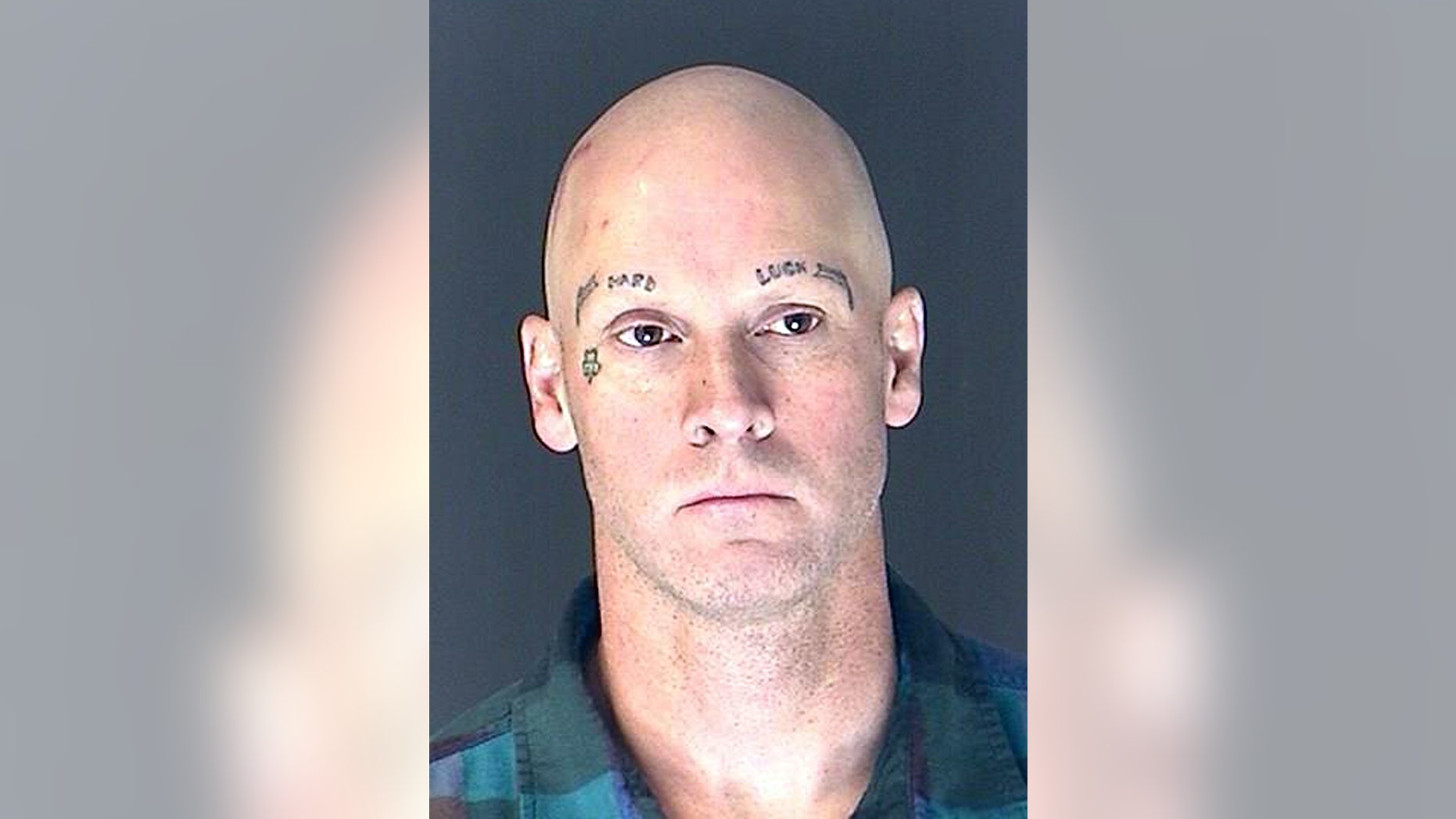 This Friday, April 5, 2013 photo provided by the El Paso County Sheriff's Office shows 47-year-old James Lohr. Lohr, a white supremacist prison gang member, was arrested and another was still being sought for questioning Friday in the death of Colorado's prisons chief as authorities investigated whether the gang had any ties to the killing. (AP Photo/El Paso County Sheriff's Office)