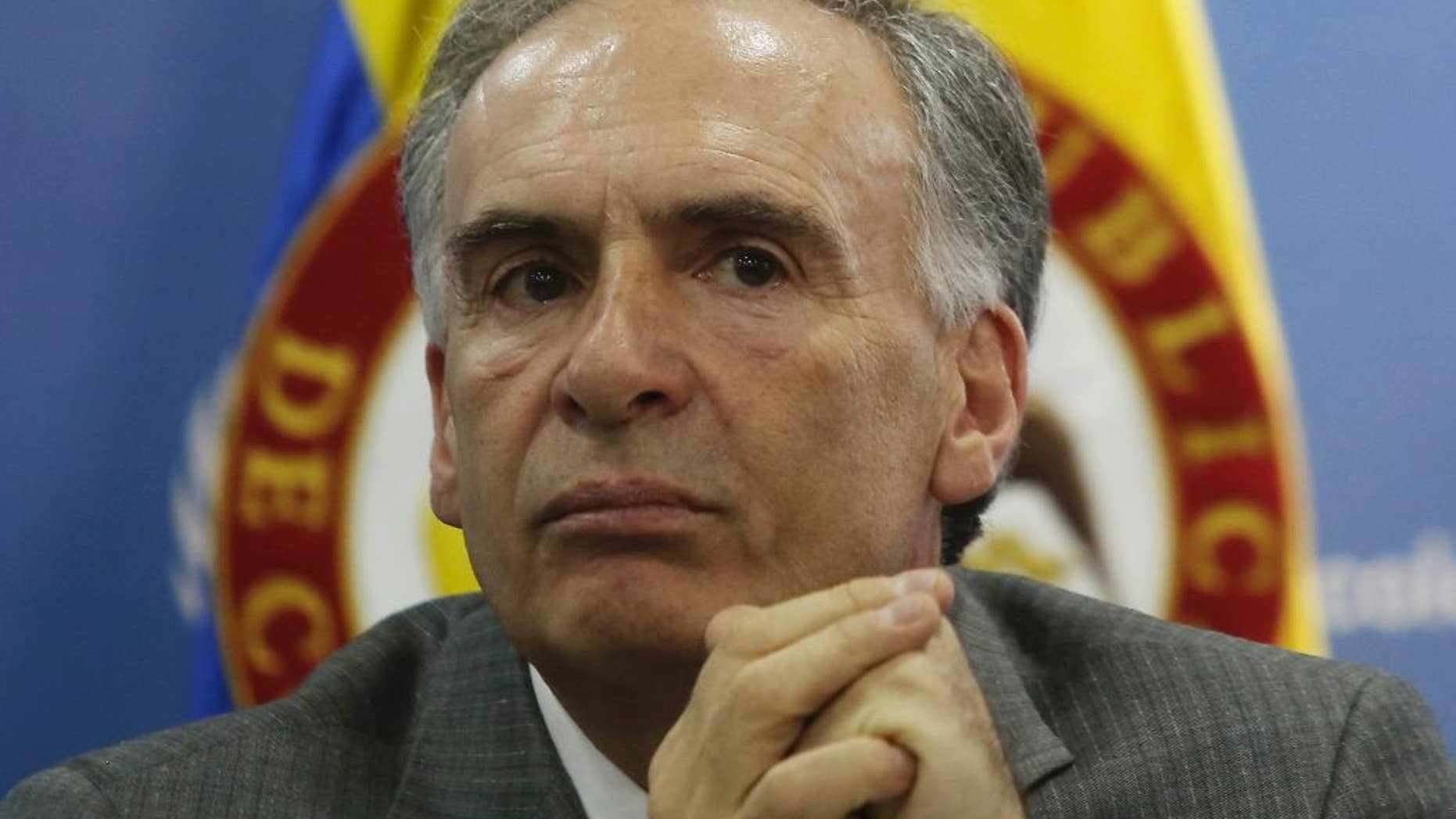 FILE - In this Monday, Oct. 10, 2016, file photo, Jean Arnault, of France, the head of the U.N. political mission inColombia, attends a press conference in Bogota, Colombia. Colombians don't want the peace process to unravel and would like to see quick agreement on a new peace deal to replace the one rejected by voters, Arnault said Wednesday, Oct. 19. (AP Photo/Ivan Valencia, File)