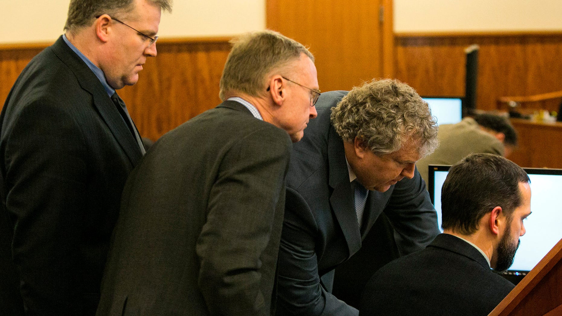 Prosecution and defense teams during the murder trial for Aaron Hernandez in Fall River, Mass., Feb. 20, 2015.