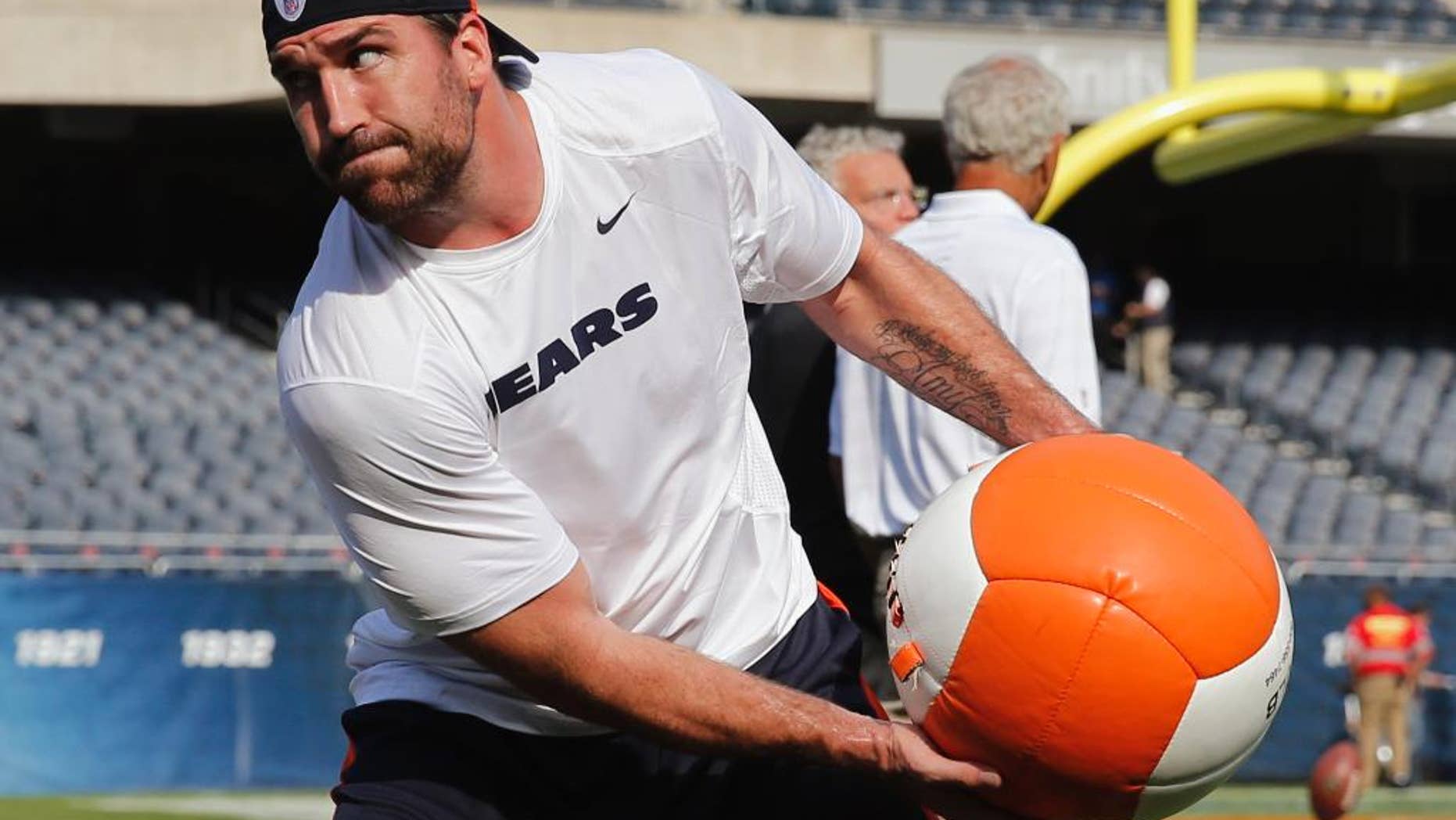 Chicago Bears defensive end Jared Allen warms up before an NFL preseason football game against the Philadelphia Eagles Friday, Aug. 8, 2014, in Chicago. (AP Photo/Charles Rex Arbogast)