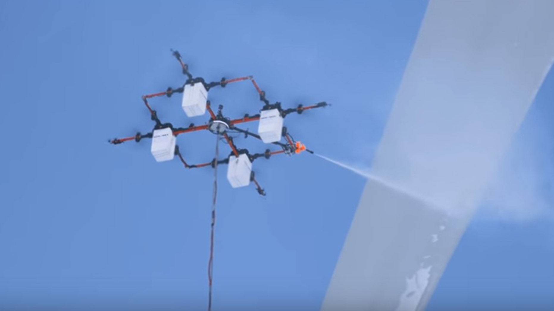 YouTube screenshot of the Aerones wind turbine cleaning drone (Aerones/YouTube)