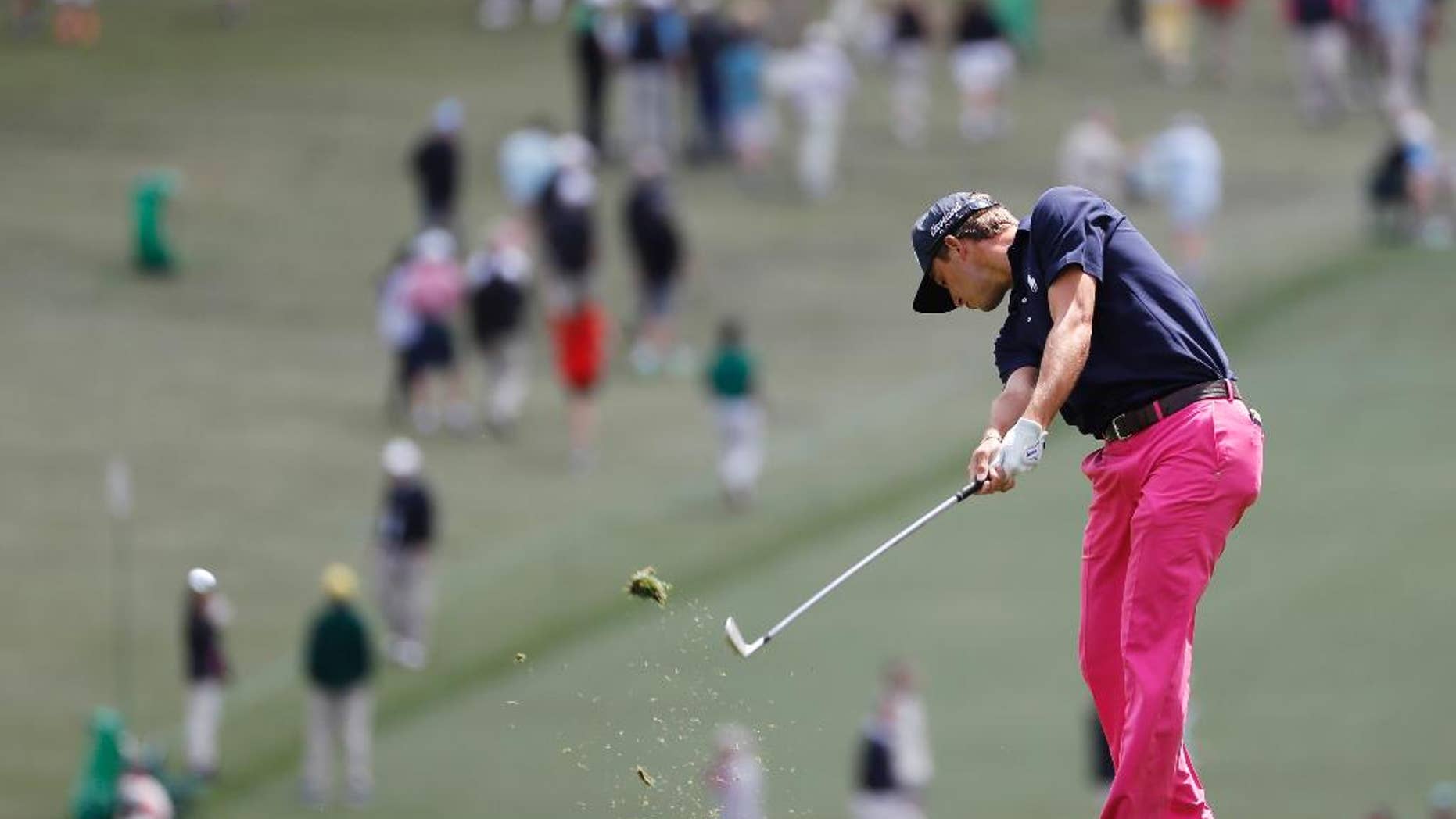 FILE - In this April 7, 2016, file photo, Smylie Kaufman hits on the first fairway during the first round of the Masters golf tournament in Augusta, Ga. Fresh off his impressive showing at the Masters, PGA Tour rookie and former LSU golfer Kaufman is preparing for another heaping of fanfare at the Zurich Classic. “This is definitely a home game for me,” Kaufman said. In terms of fan support, that is. As far as knowing the ins and outs of the Pete Dye-designed TPC Louisiana course, not so much. (AP Photo/Matt Slocum, File)