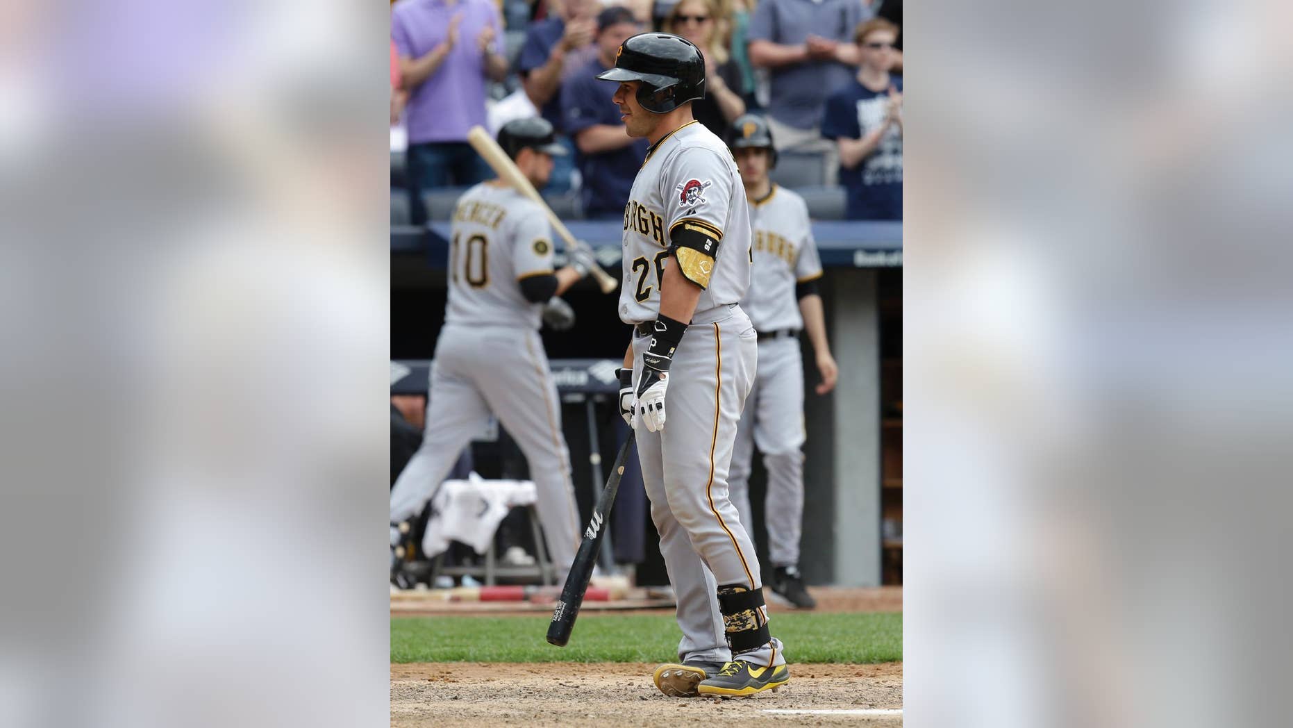 Pittsburgh Pirates' Tony Sanchez reacts after striking out to end the first game of a double-header against the New York Yankees at Yankee Stadium, Sunday, May 18, 2014 in New York. The Yankees defeated the Pirates 4-3. (AP Photo/Seth Wenig)