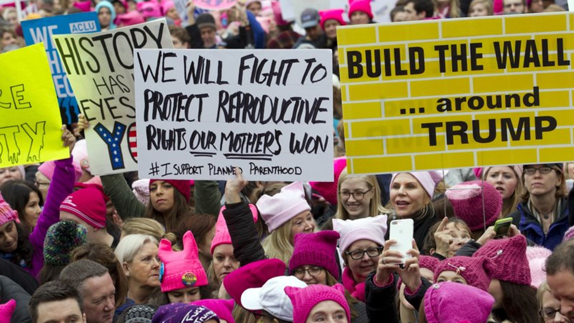 January 21, 2017: Women with bright pink hats known as the "pussy hats" gather for the Women's March in Washington, DC.