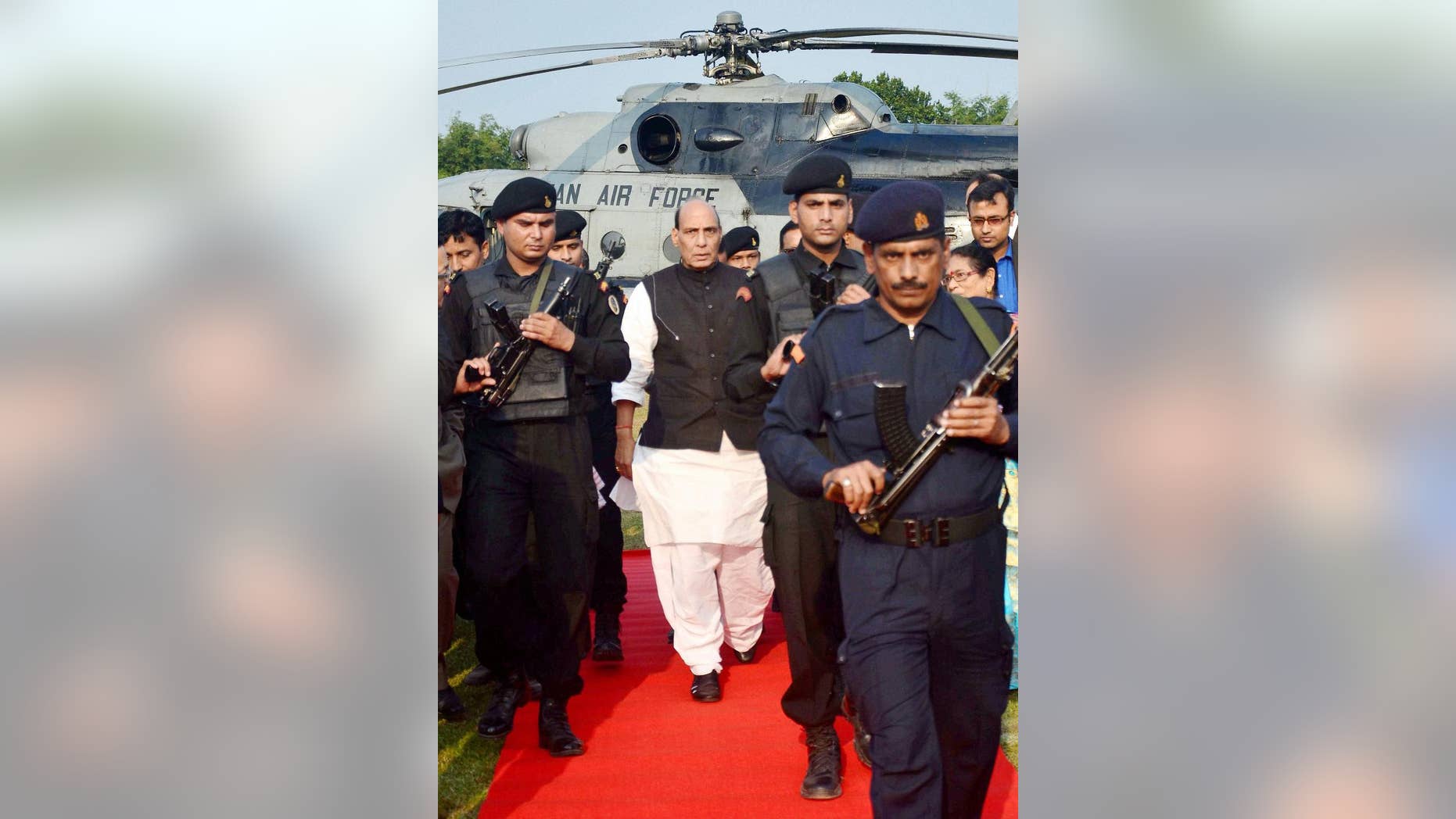 Indian Home Minister Rajnath Singh arrives to lay the foundation stone for the Central Forensic Science Laboratory on the outskirts of Gauhati, in the northeastern Indian state of Assam, Saturday, Nov. 29, 2014. Singh, the second-most powerful official in India after Prime Minister Narendra Modi, hit out at Pakistan on Saturday, accusing its state agencies of using terror to try to destabilize India, and rejecting Pakistan's assertion that non-state actors are involved in terrorism. (AP Photo/Press Trust of India)