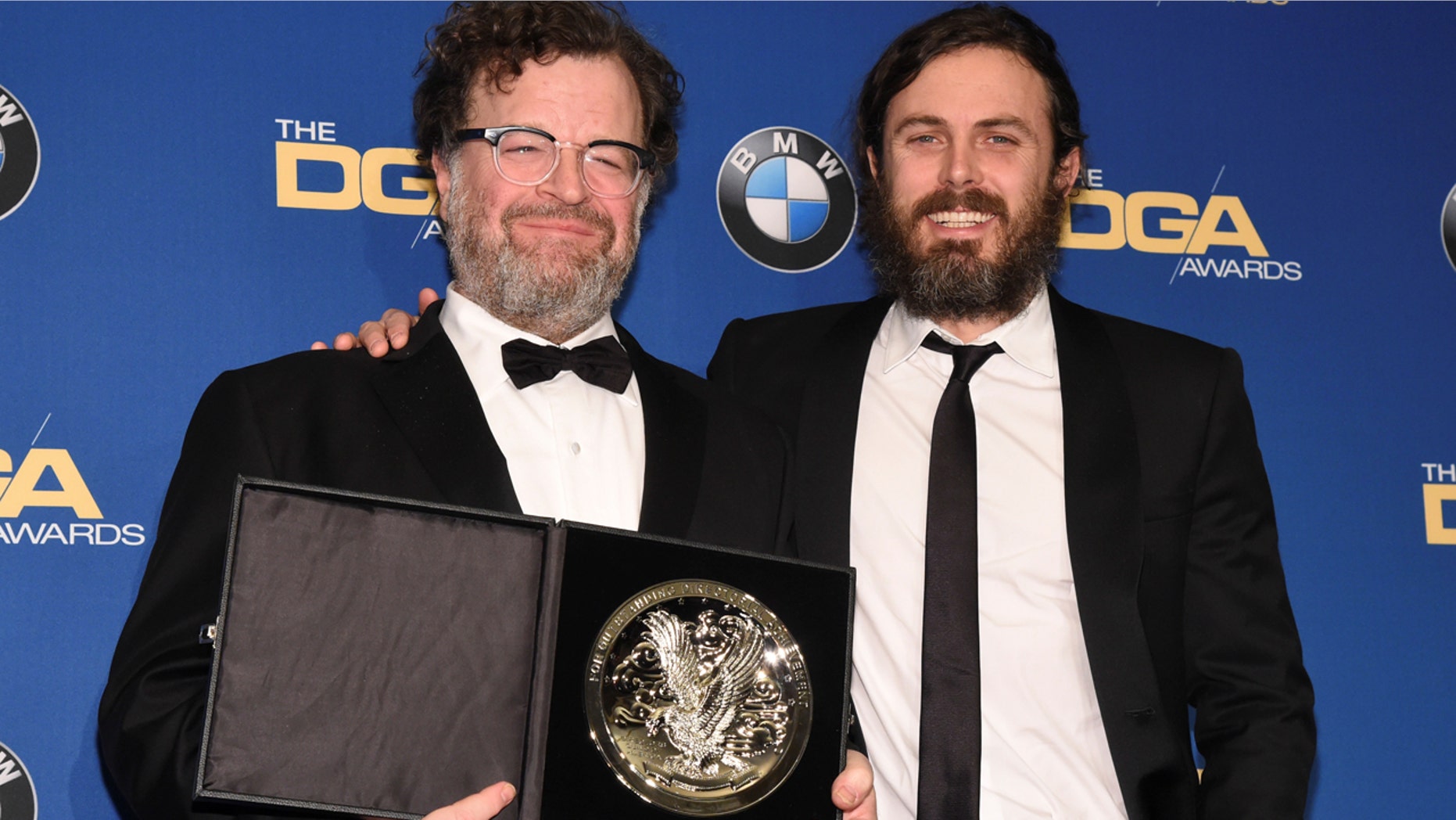 Feature Film Award nominee, Kenneth Lonergan, left, poses for photographers with Casey Affleck, right, at the 69th annual DGA Awards in Beverly Hills, Cali., on February 4, 2017.