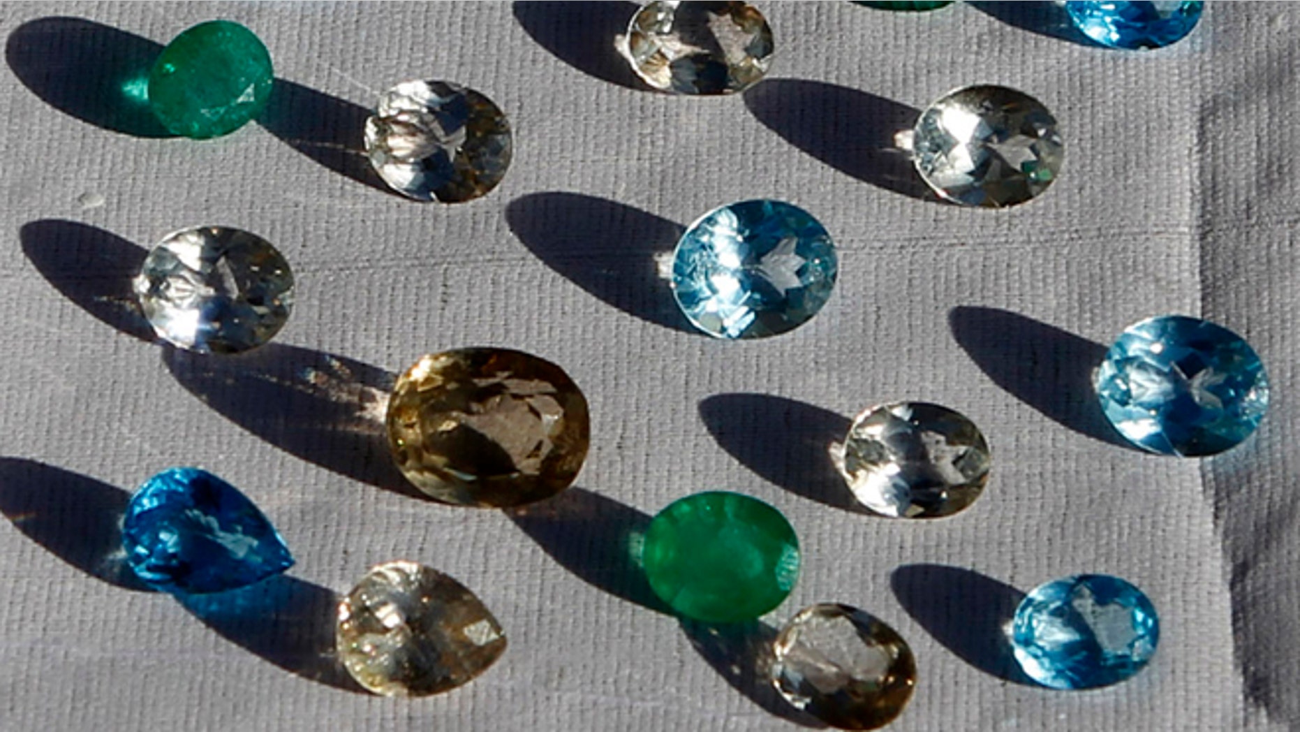 This March 2012 file photo shows gemstones on display at a shop inside a joint U.S.-Afghan military base in eastern Afghanistan.