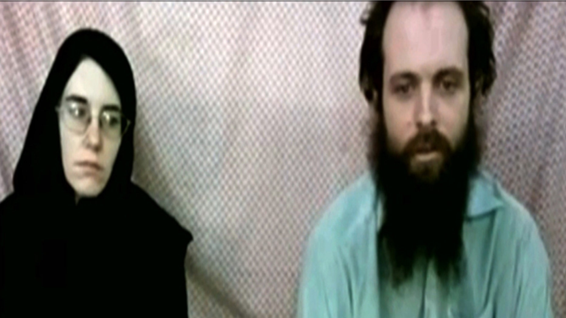 This frame grab from video provided by the Coleman family shows Caitlan Coleman and Joshua Boyle. The family of a then-pregnant American woman who disappeared in Afghanistan in late 2012 with her Canadian husband received two videos last year in which the couple asked the U.S. government to help free them from their Taliban captors, The Associated Press has learned.