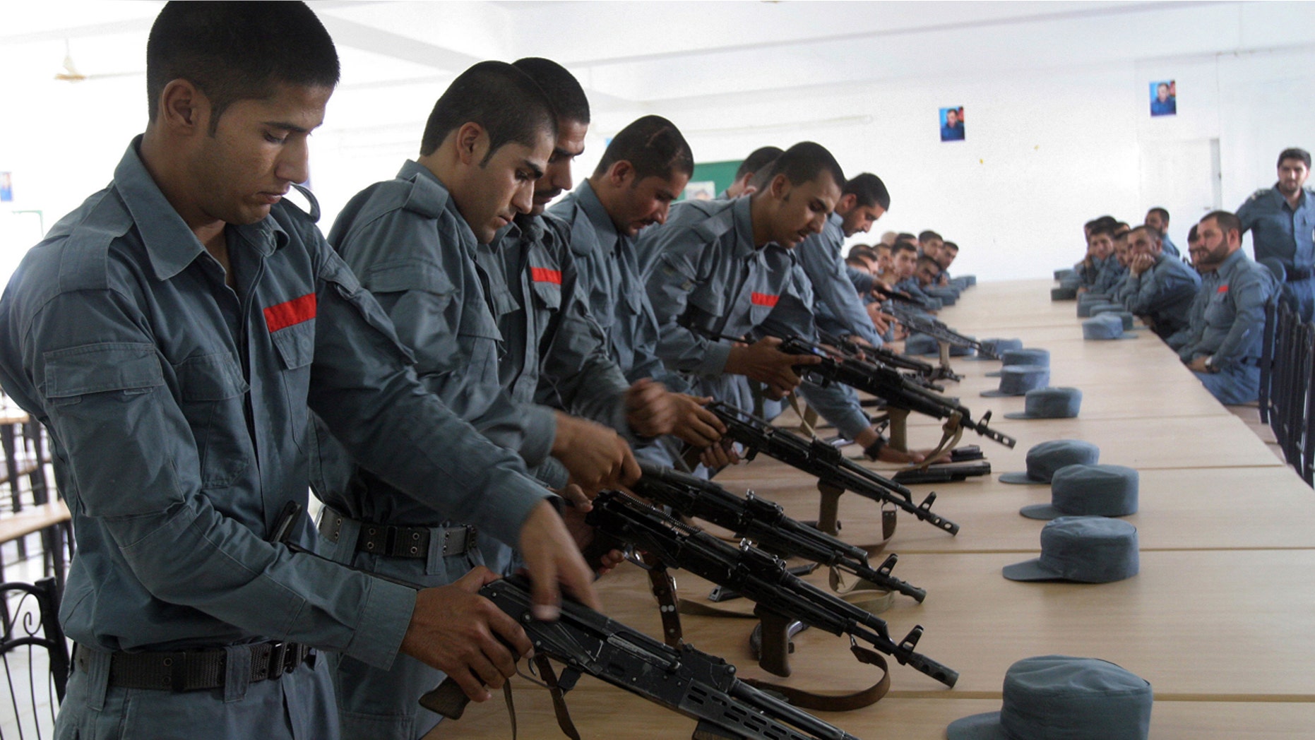July 24, 2016: Afghan police soldiers practice, in Lashkargah, capital of southern Helmand province, Afghanistan