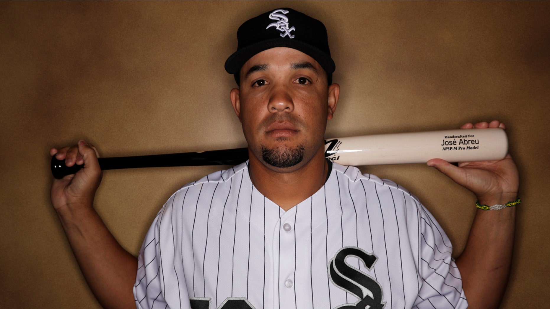 This is a Feb. 23, 2017, file photo showing Chicago White Sox' Jose Abreu posed during the team's photo day in Glendale, Ariz.