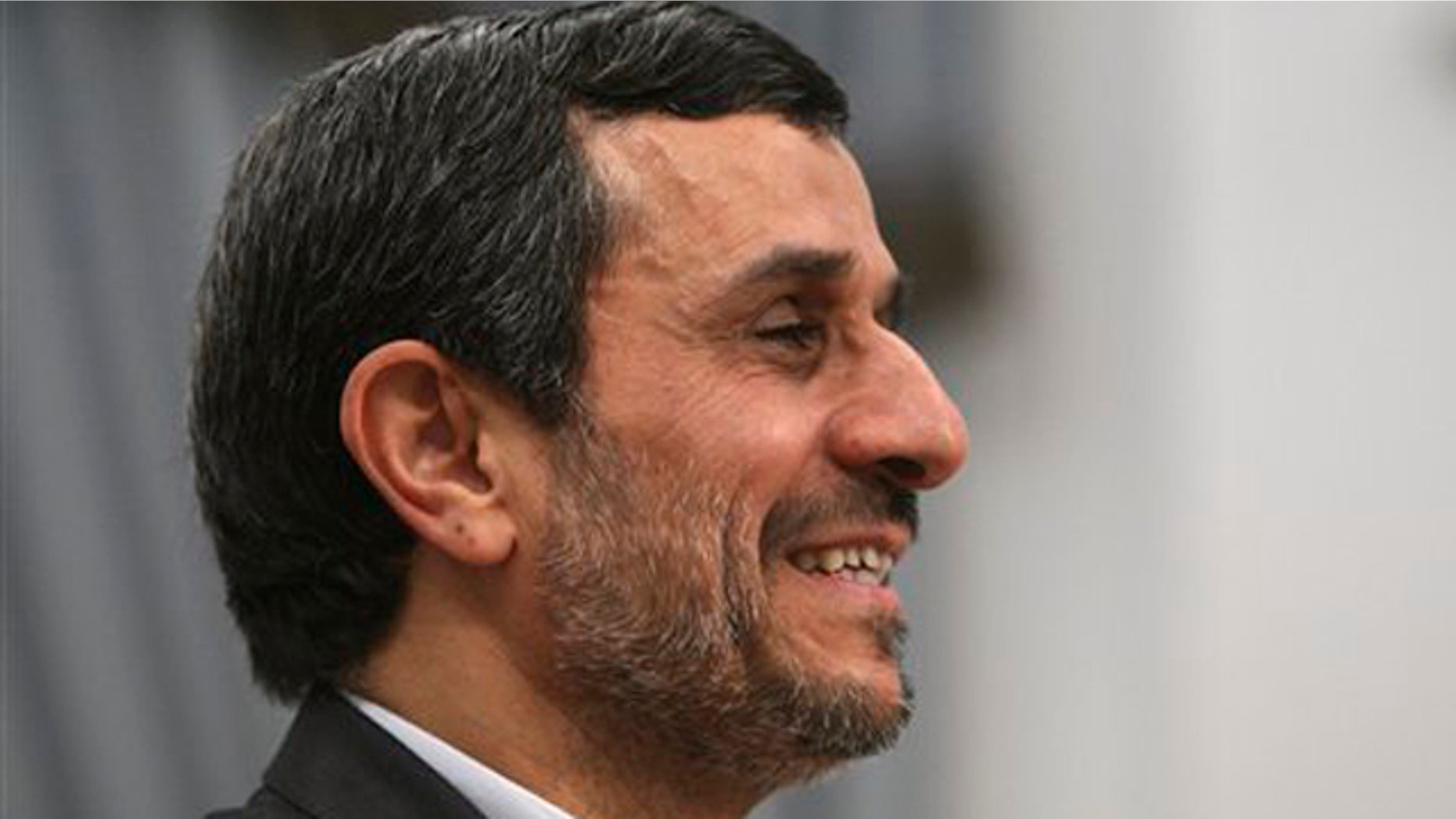Dec. 13, 2011: Iranian President Mahmoud Ahmadinejad, smiles, prior to a meeting at the presidency office in Tehran, Iran.