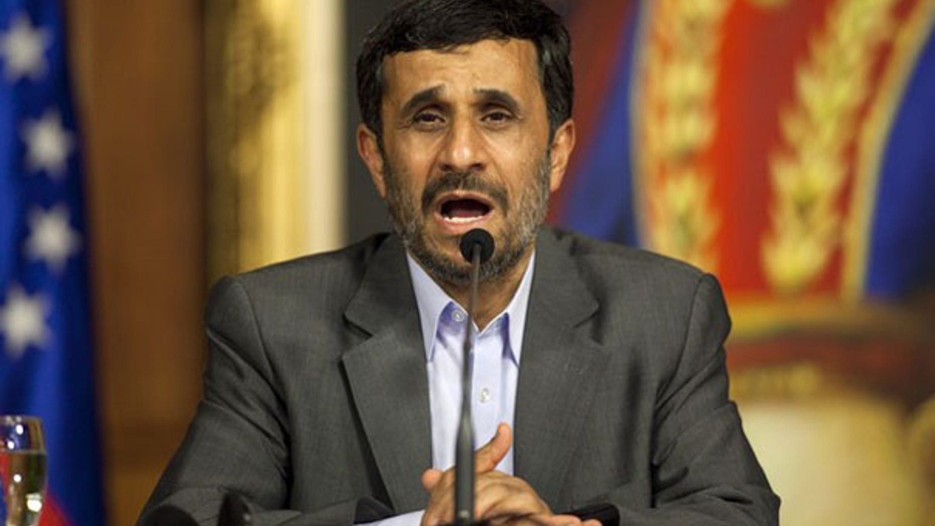 Iran President Mahmoud Ahmadinejad talks to the media in Caracas, Venezuela, Nov. 25. (Reuters Photo)