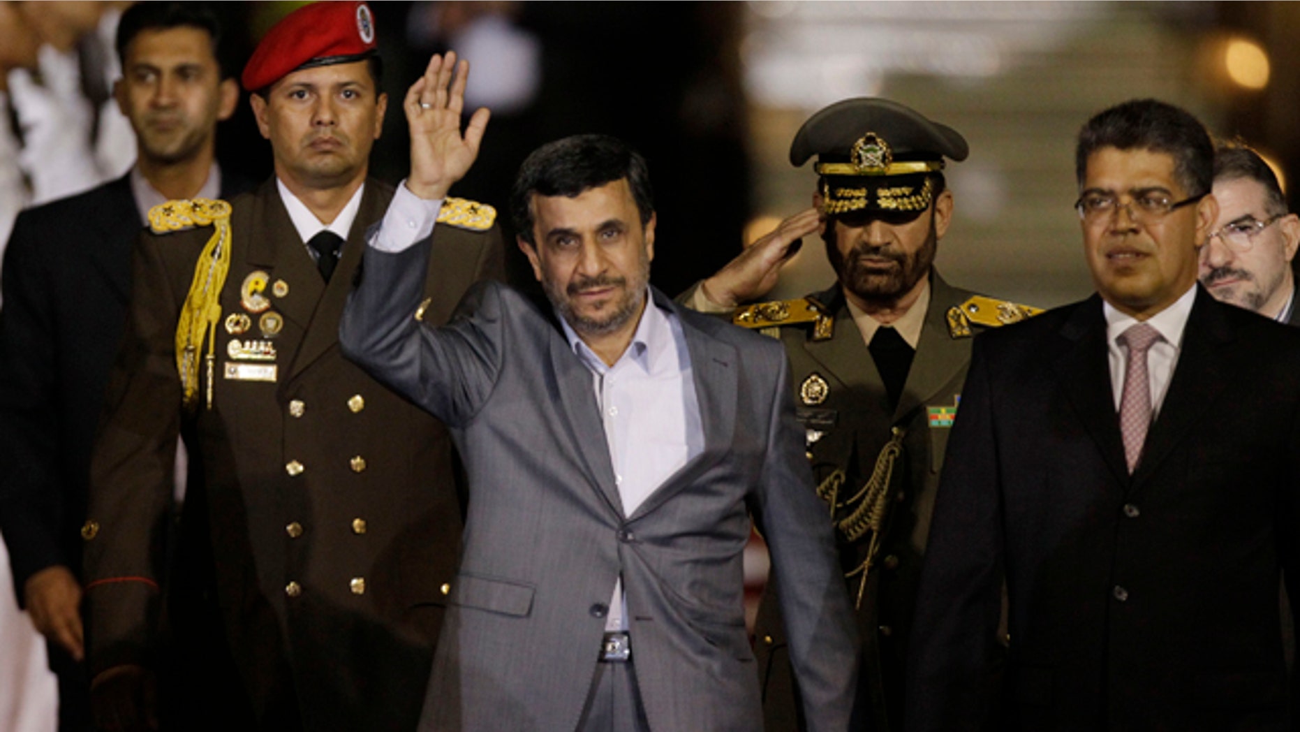 Jan. 8, 2012: Iran's President Mahmoud Ahmadinejad waves upon his arrival at the international airport in Maiquetia, Venezuela.