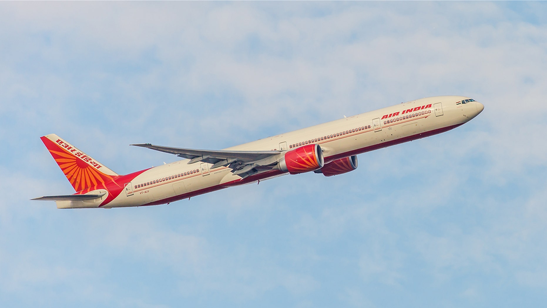 An Air India jet is seen in flight, Nov. 2, 2013.