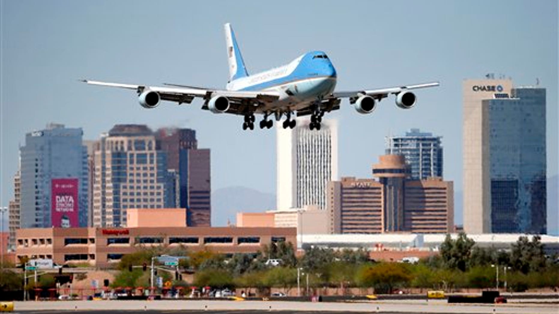 Air Force One arrives at Sky Harbor International Airport, Friday, March 13, 2015, in Phoenix. (AP Photo/Matt York)