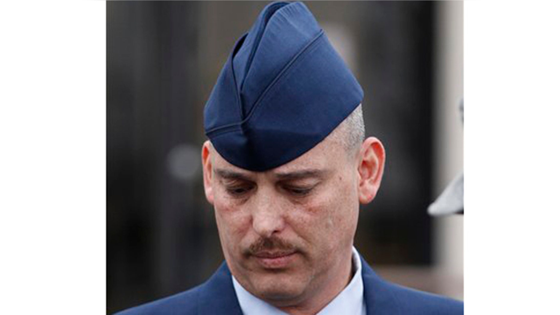 Jan. 19, 2011: Air Force Sgt. David Gutierrez walks out of the Law Center at McConnell Air Force Base in Wichita, Kan., for a lunch recess. The defense rested Wednesday for Gutierrez, who is HIV positive and is accused of exposing multiple sex partners to HIV at swinger parties.