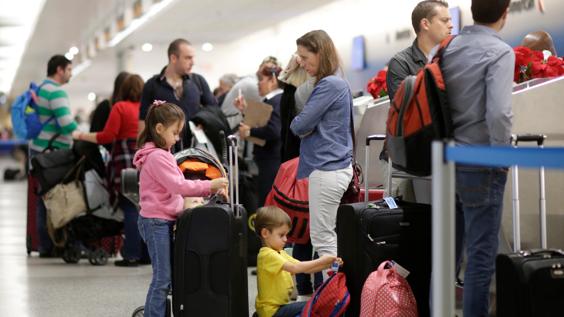 Travelers in Miami International Airport