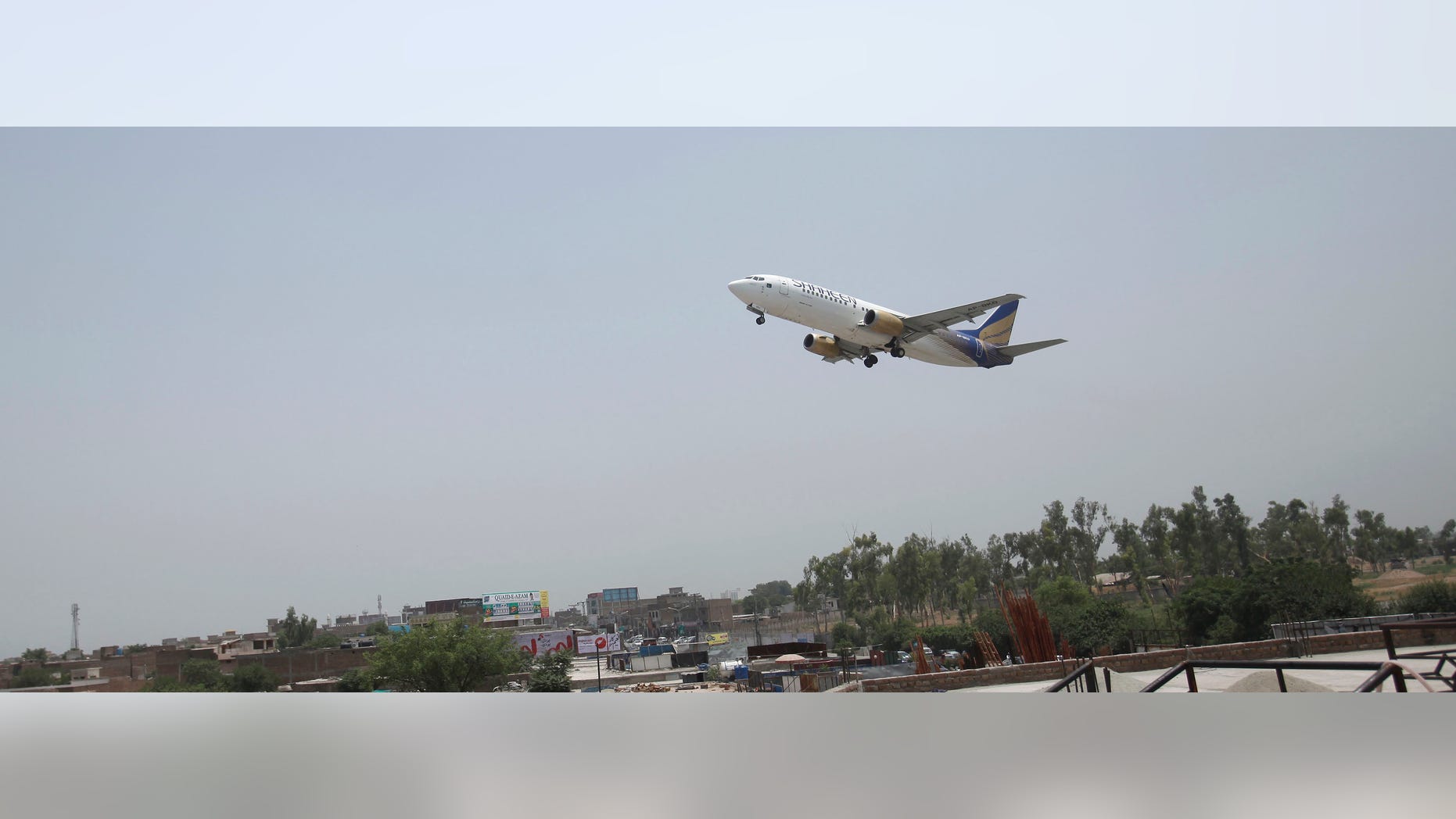 FILE: June 2014: A commercial airplane leaves Bacha Khan airport in Peshaswar, Pakistan.