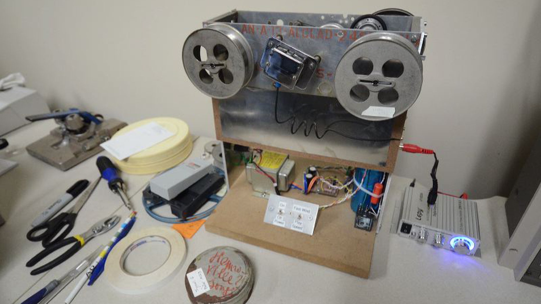 The wire recorder that, once modernized, released the voices recorded in song at a refugee camp in Henonville, France, decades earlier (The University of Akron).