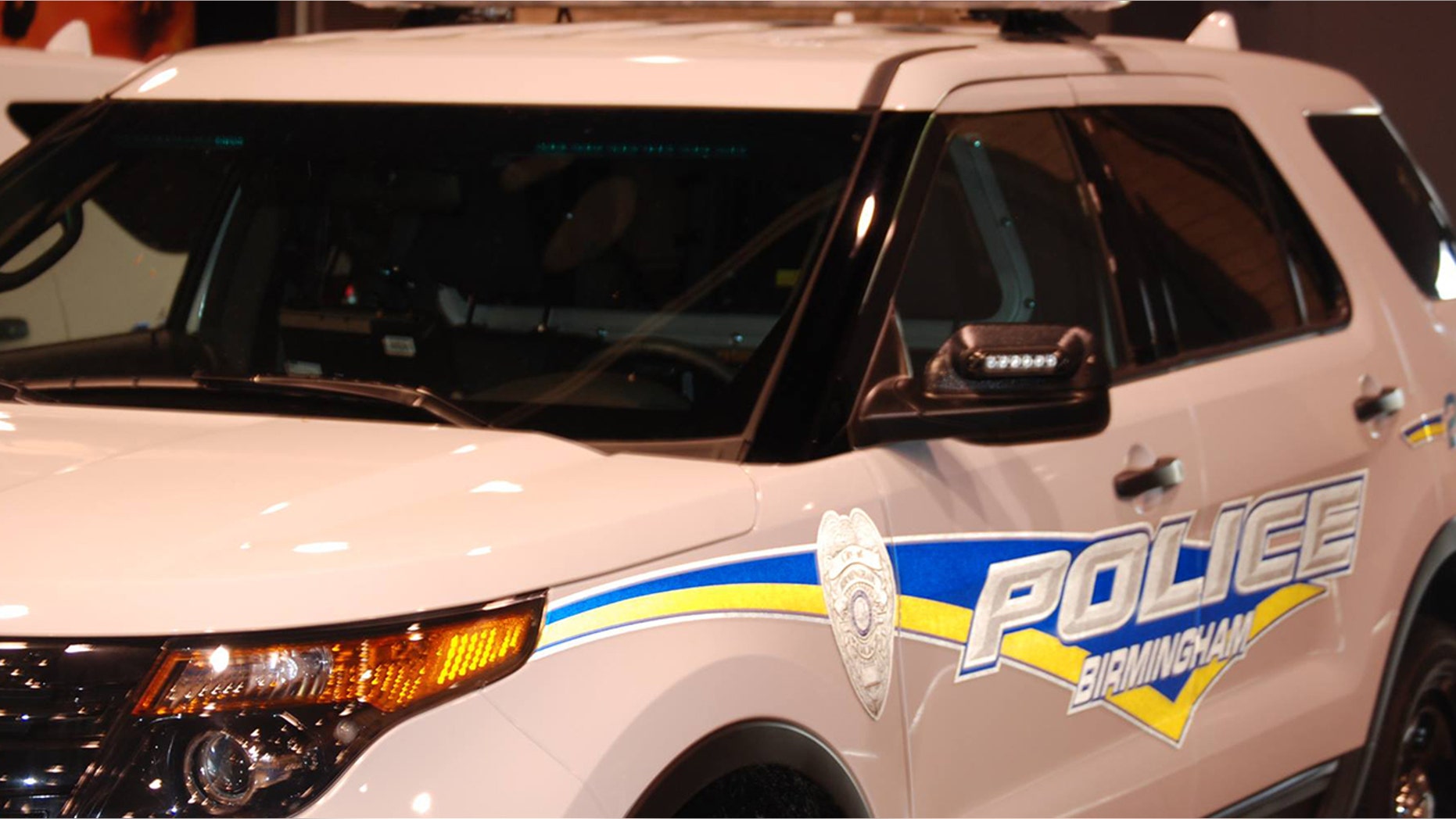 A pair of Birmingham police officers were injured while pursuing carjacking suspects.