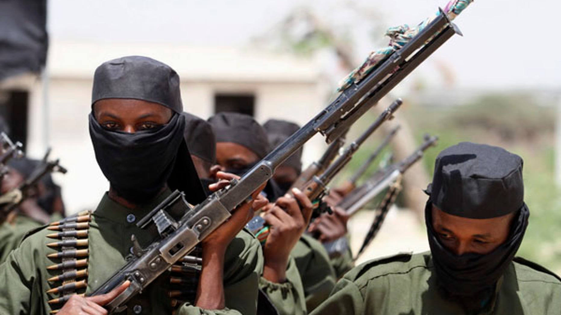 New recruits from the al-Shabaab terror group march during a parade.