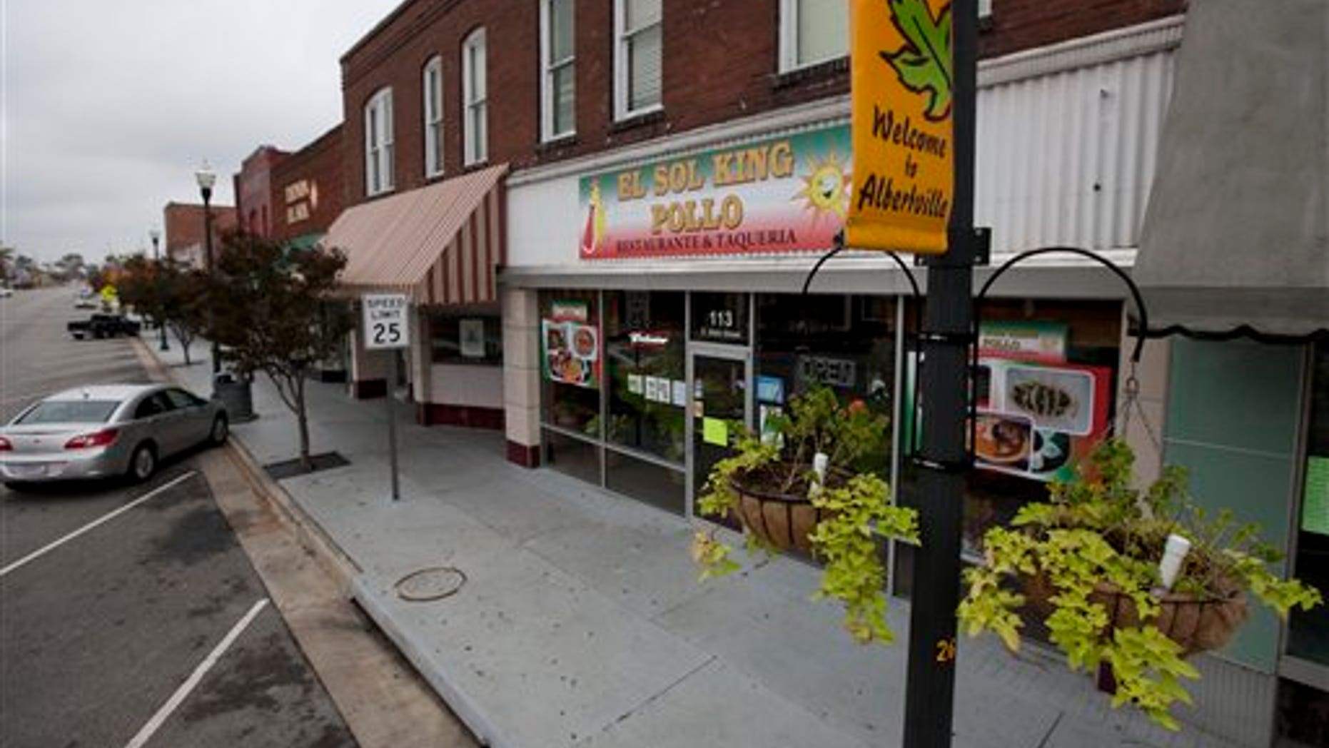 A row of Hispanic owned businesses are closed in Albertville, Ala., Wednesday, Oct. 12, 2011. Dozens of businesses across the state shut down as Hispanics took a day off from work to protest against Alabama's tough new immigration law. (AP Photo/Dave Martin)