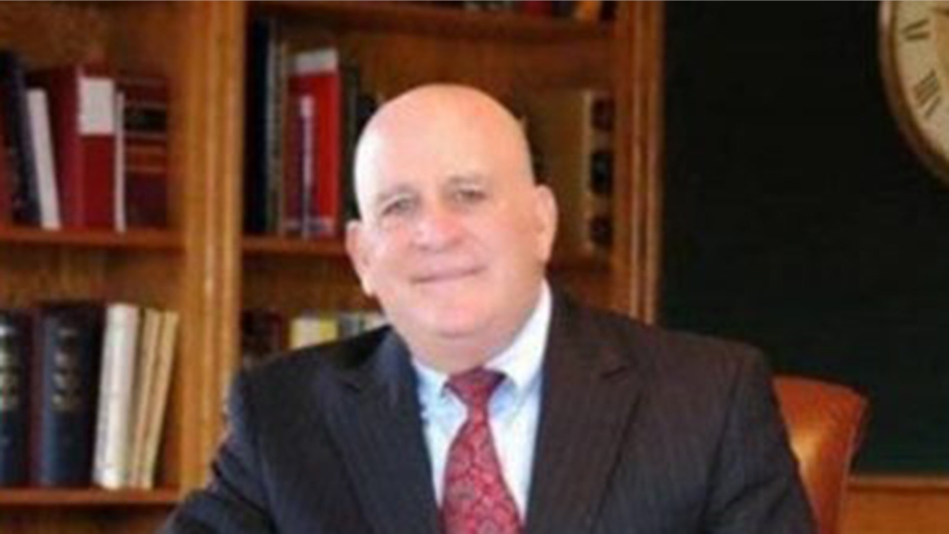 Alan J. Abrahamson staged his suicide to look like a murder, police said.