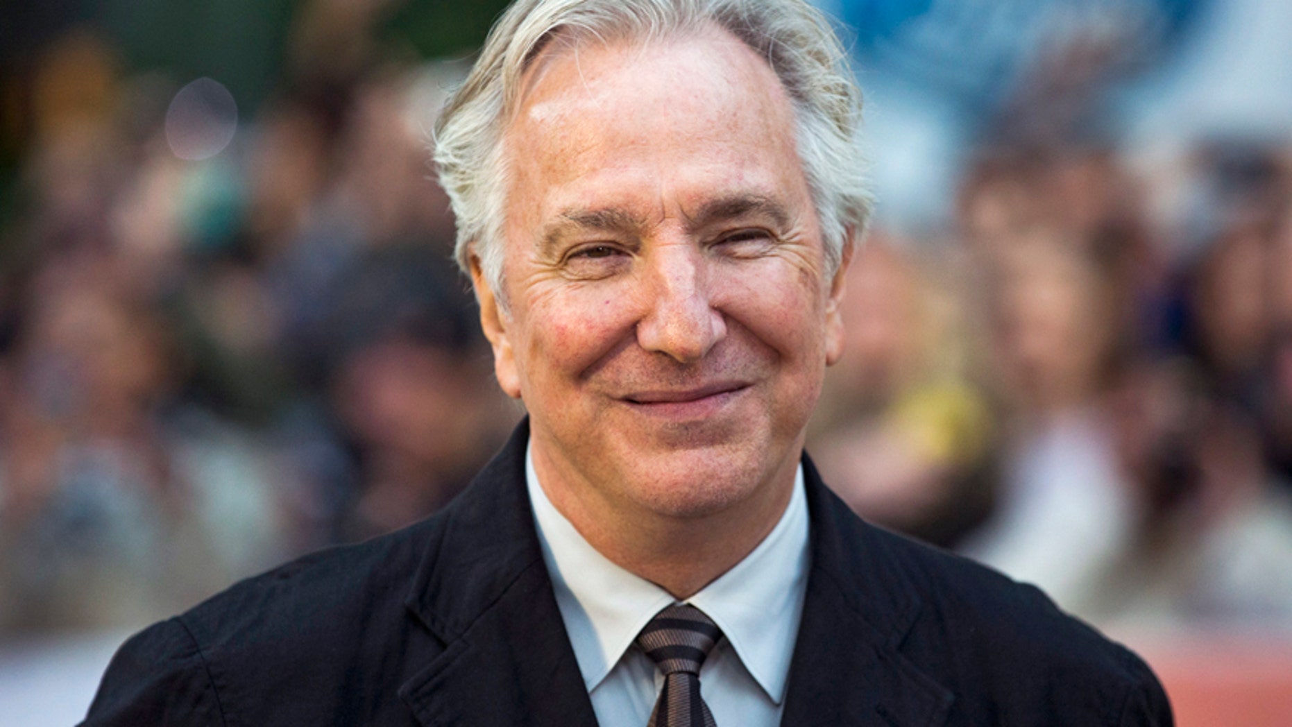 Director Alan Rickman arrives for the "A Little Chaos" gala during the Toronto International Film Festival (TIFF) in Toronto, September 13, 2014. REUTERS/Mark Blinch (CANADA - Tags: ENTERTAINMENT) - RTR4647A