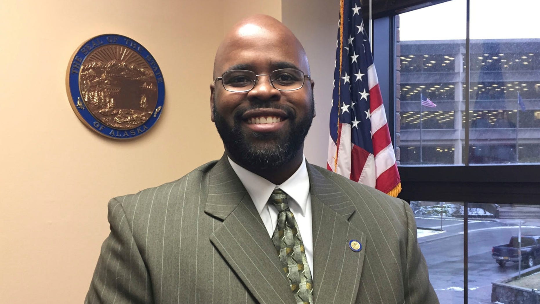 This Jan. 23, 2017, file photo shows Alaska state Sen. David Wilson posing in his Capitol office in Juneau, Alaska